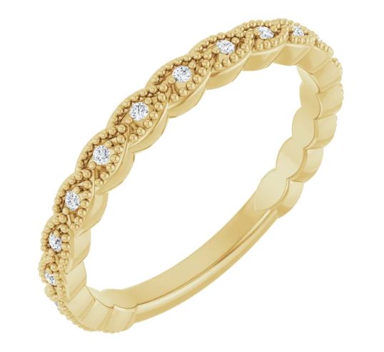 14k yellow gold diamond milgrain band. Size 6. 0.09 carats.
