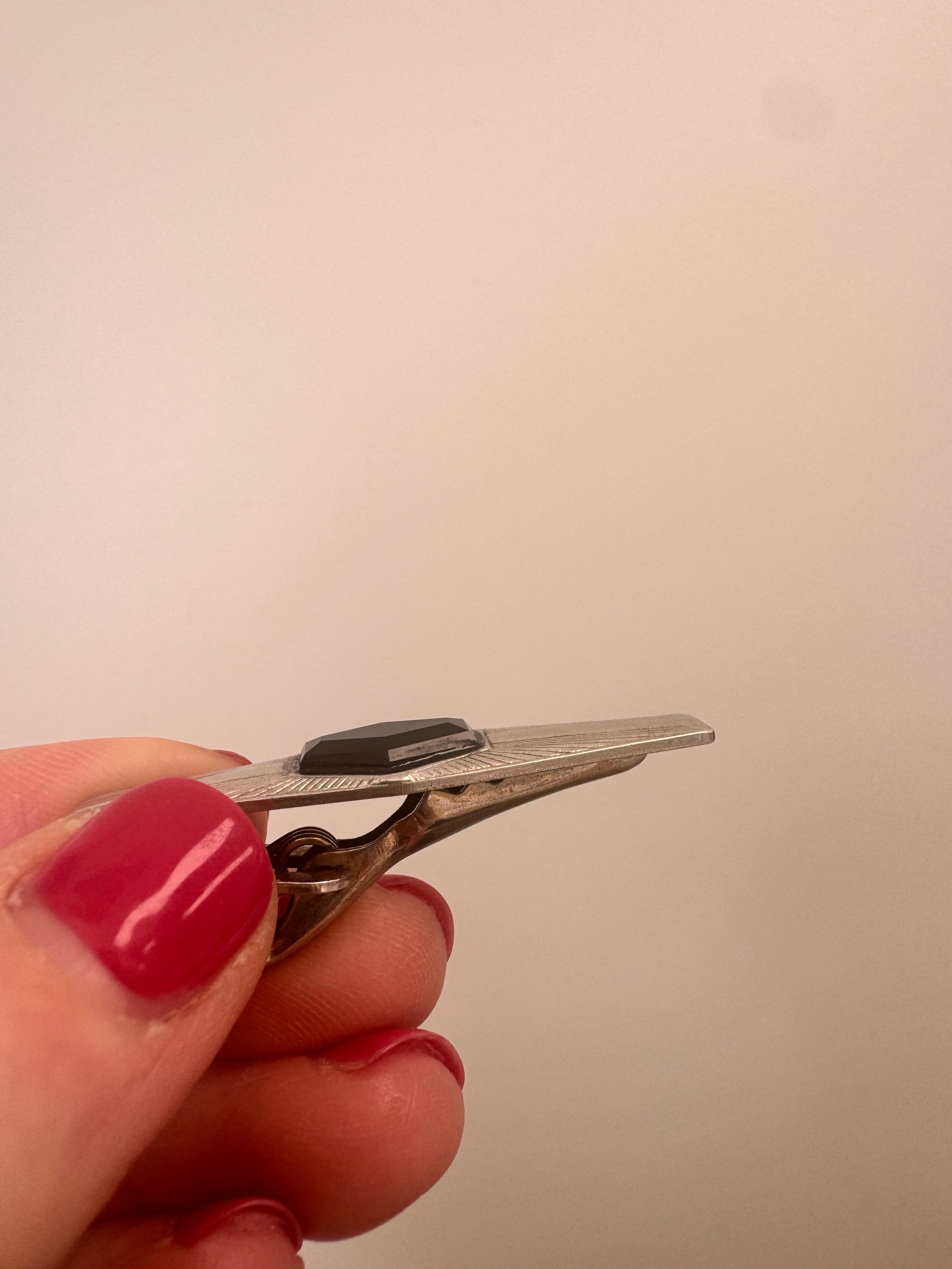 Tie Bar: Cut onyx stone to fit tie bar & add facets on top. Epoxy in place.
