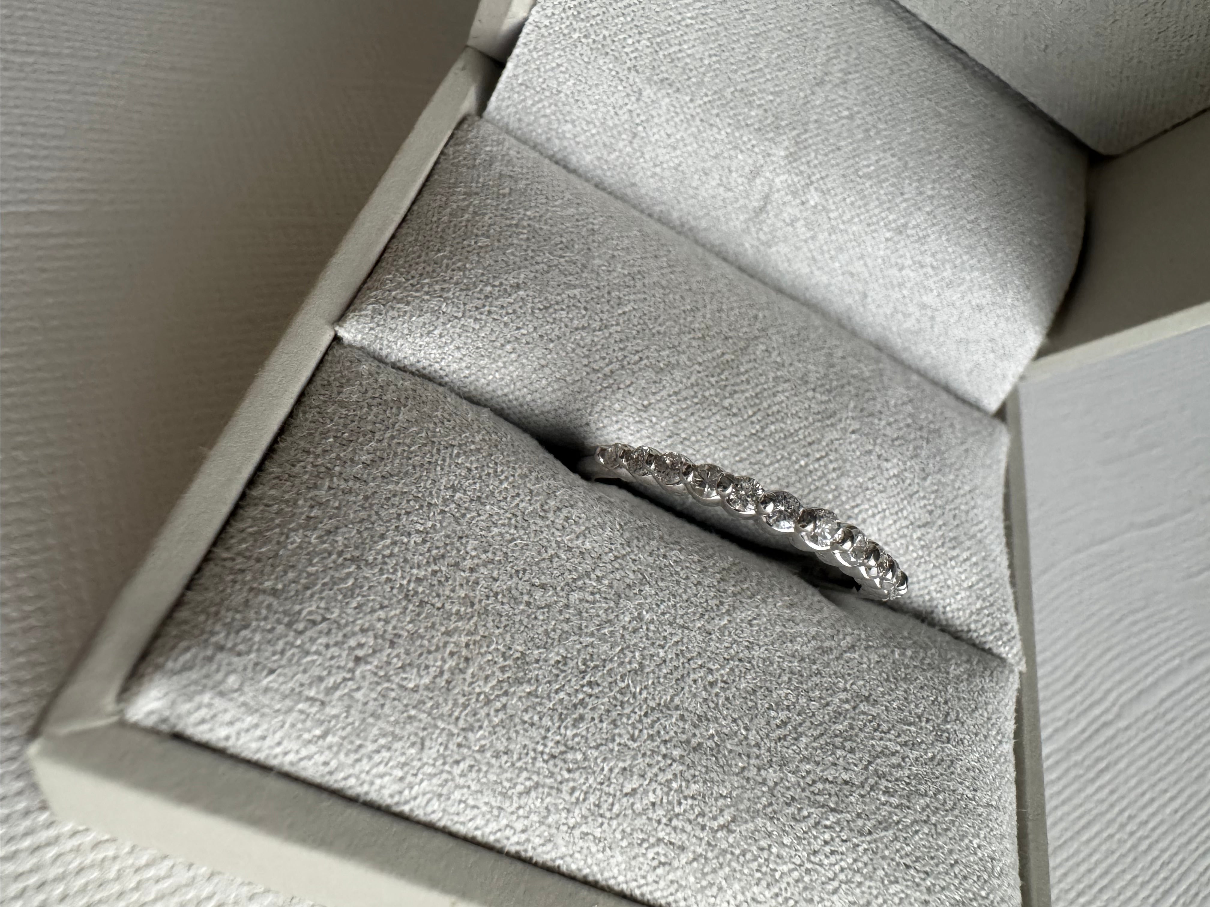 14k white gold straight diamond band using customer's 13 round brilliant cut diamonds totaling .33 carats. Size 6.75.