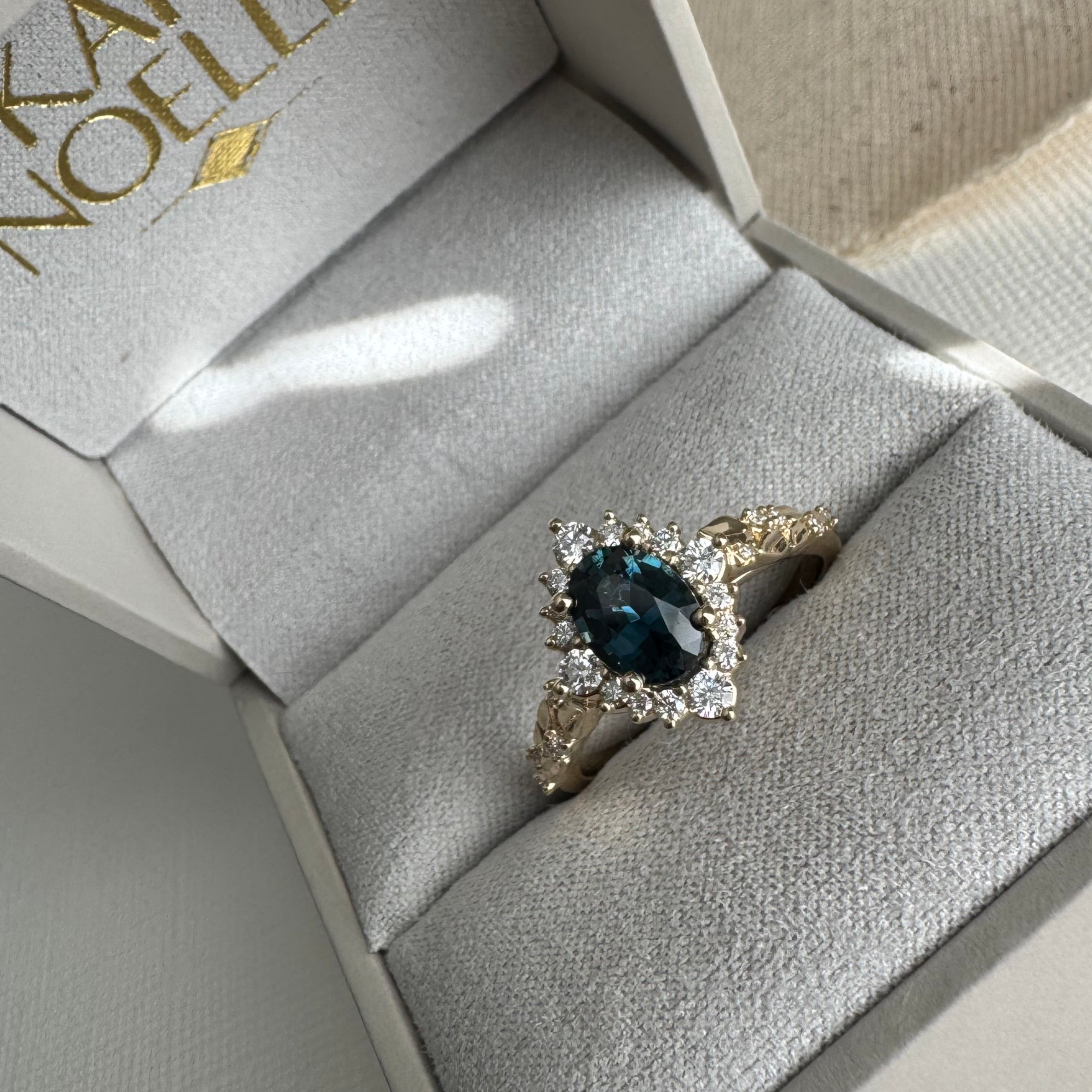 Custom, 14k yellow gold lab grown diamond and genuine sapphire (1.34 cts) oval halo, floral engagement ring. Size 8.5