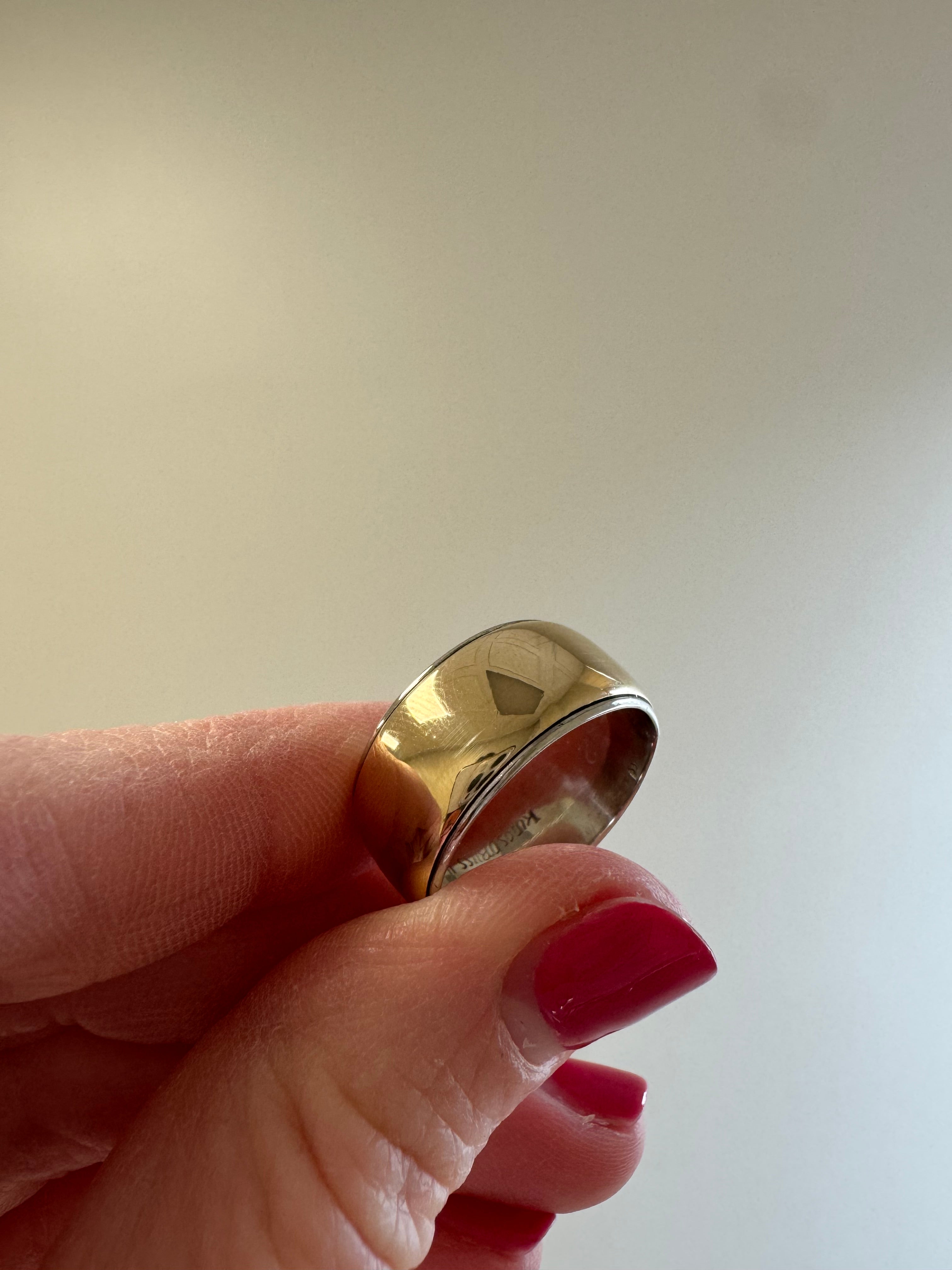 14k two-tone, 10mm wide, engraved wedding band. Stretch up 2 sizes to a 9 & polish.