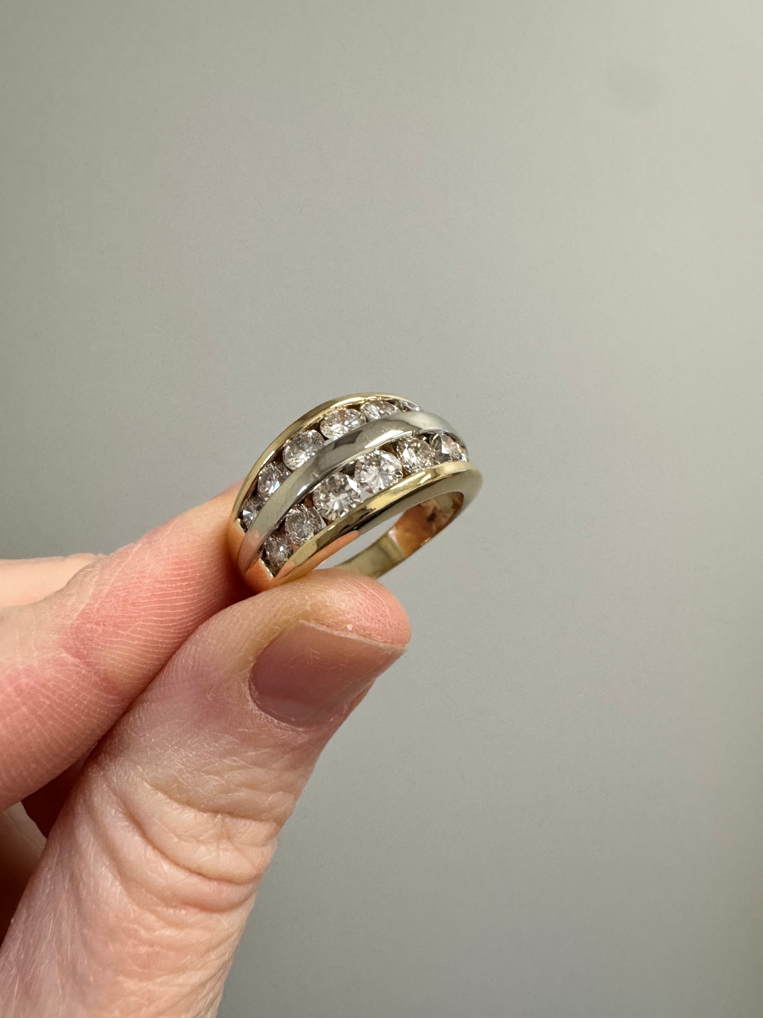 Two tone double row diamond fashion ring with graduated round diamonds: Size up to 9, do 1/4 shank & polish