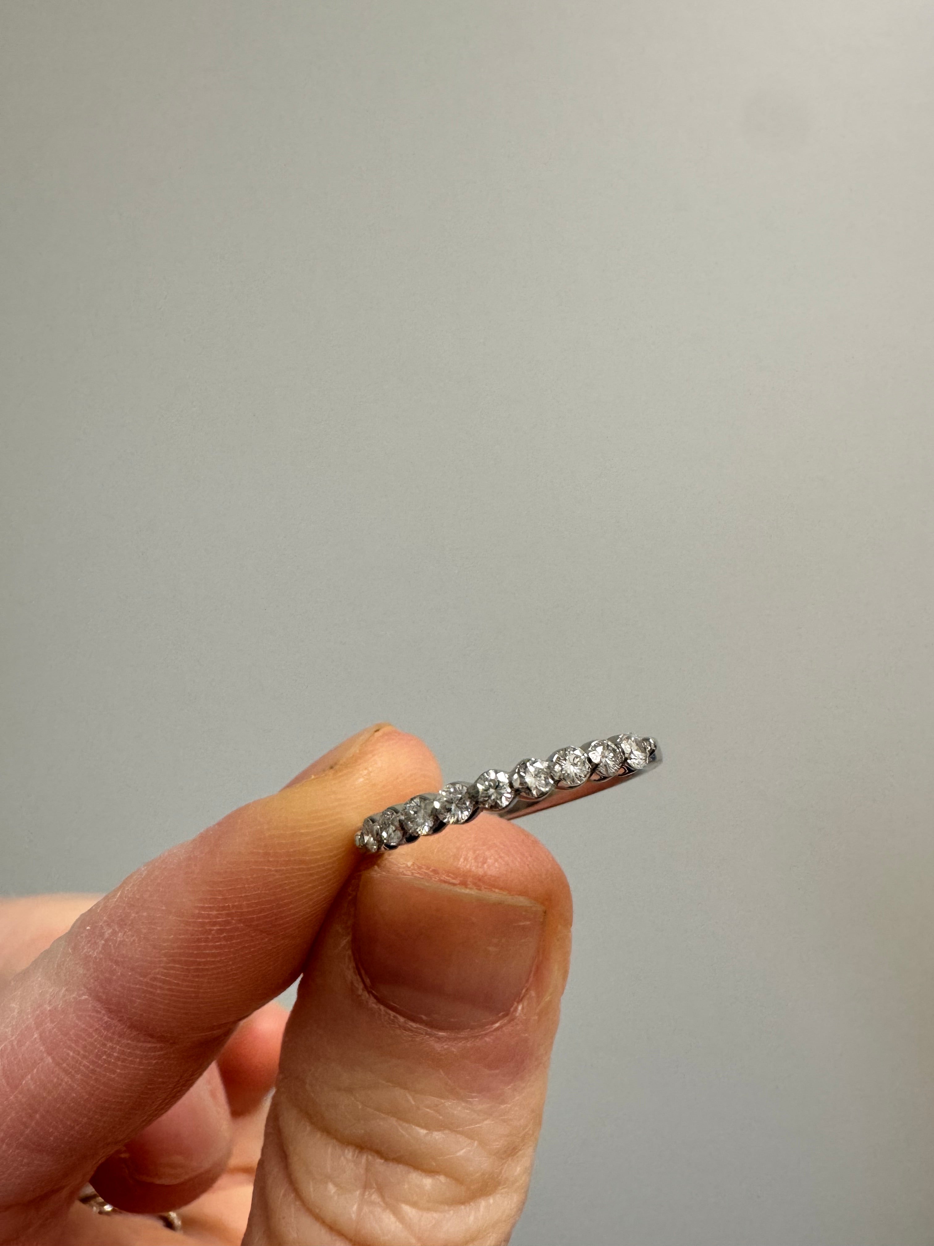 Supply & set missing round diamond (2.05mm), polish & rhodium