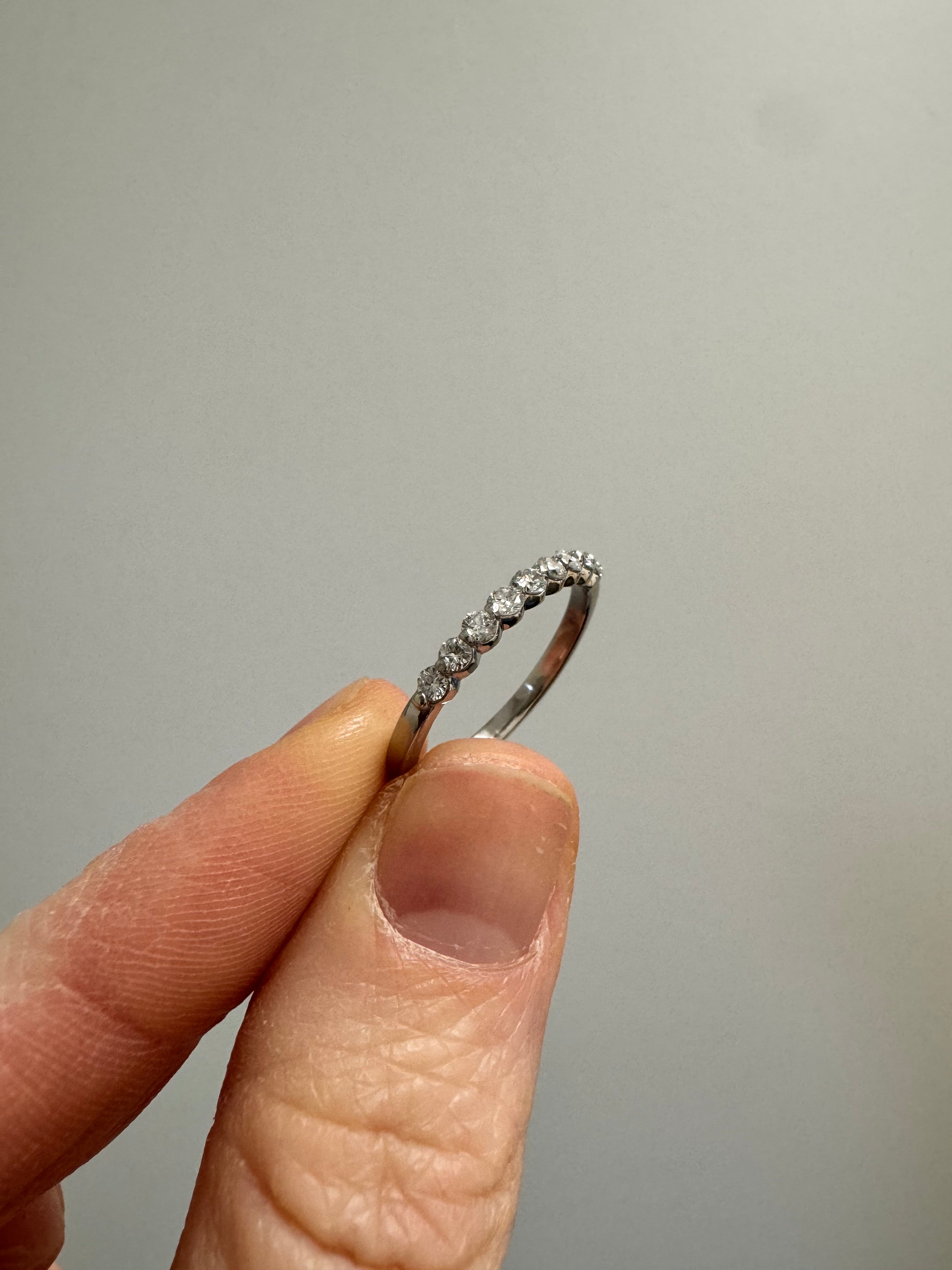 Supply & set missing round diamond (2.05mm), polish & rhodium