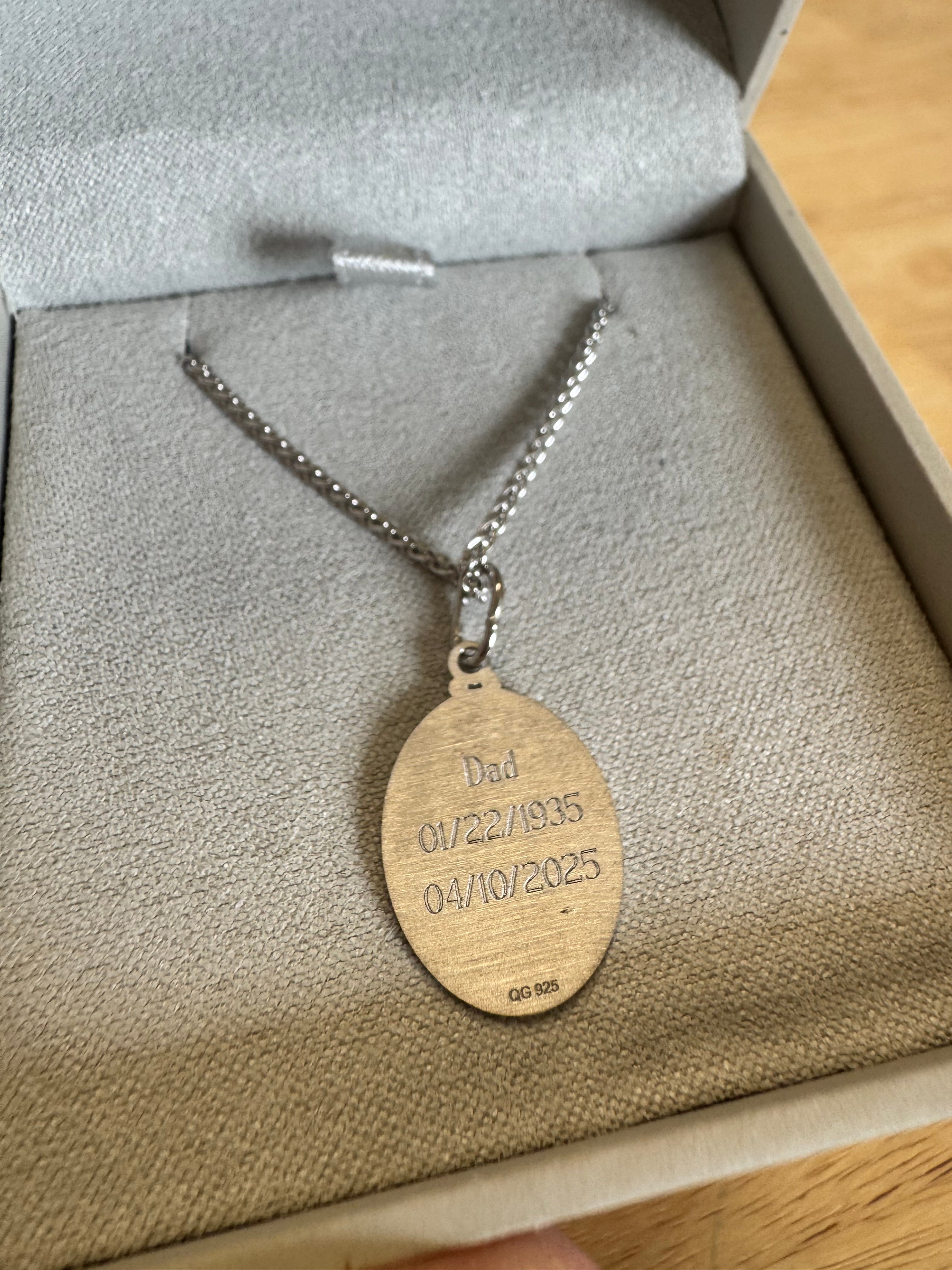 Sterling silver rhodium plated finger print pendant with engraving on back. 20"