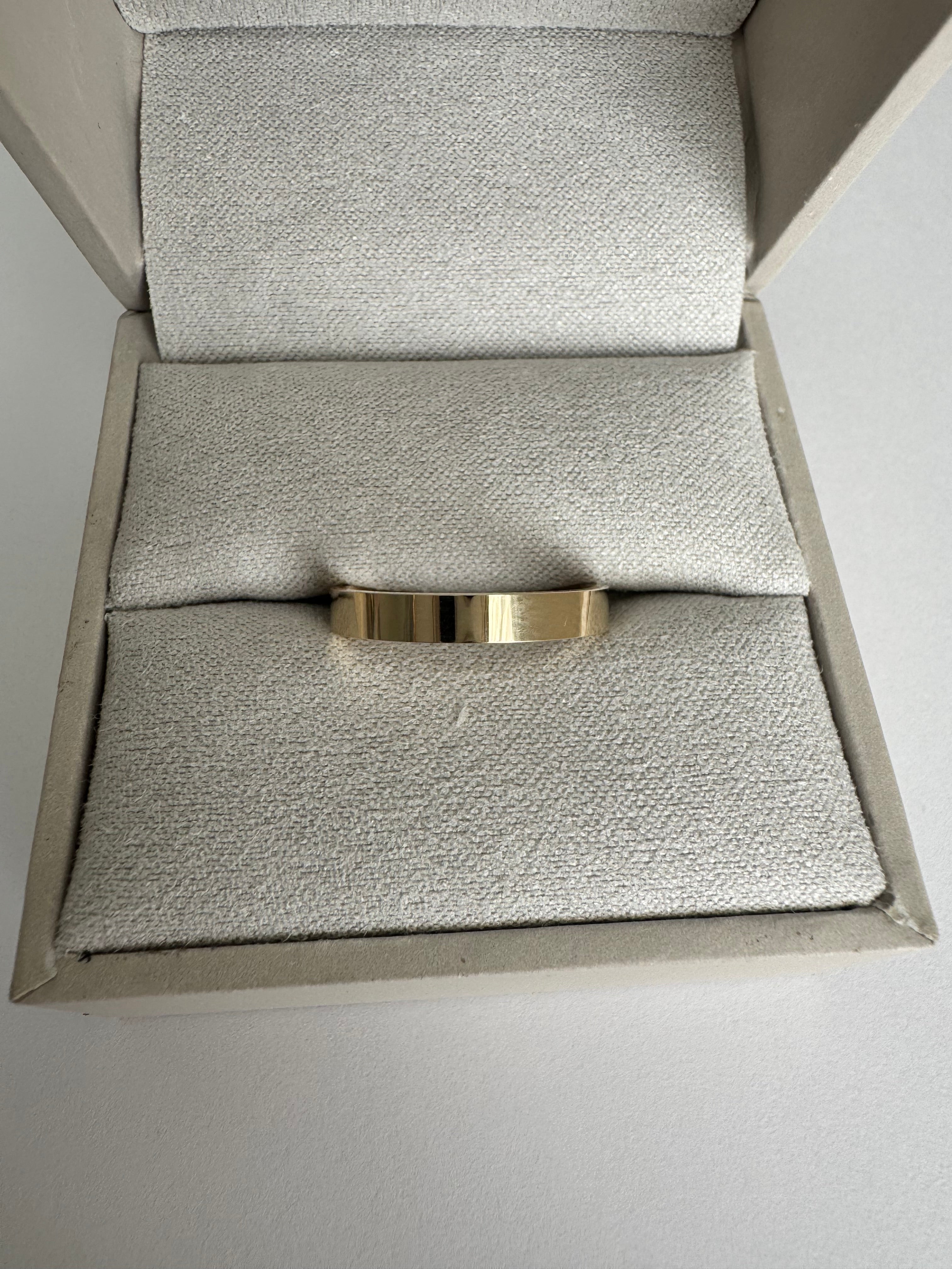 10k yellow gold, flat style, 3mm wide comfort fit light band. Size 6. 1.804 dwt.