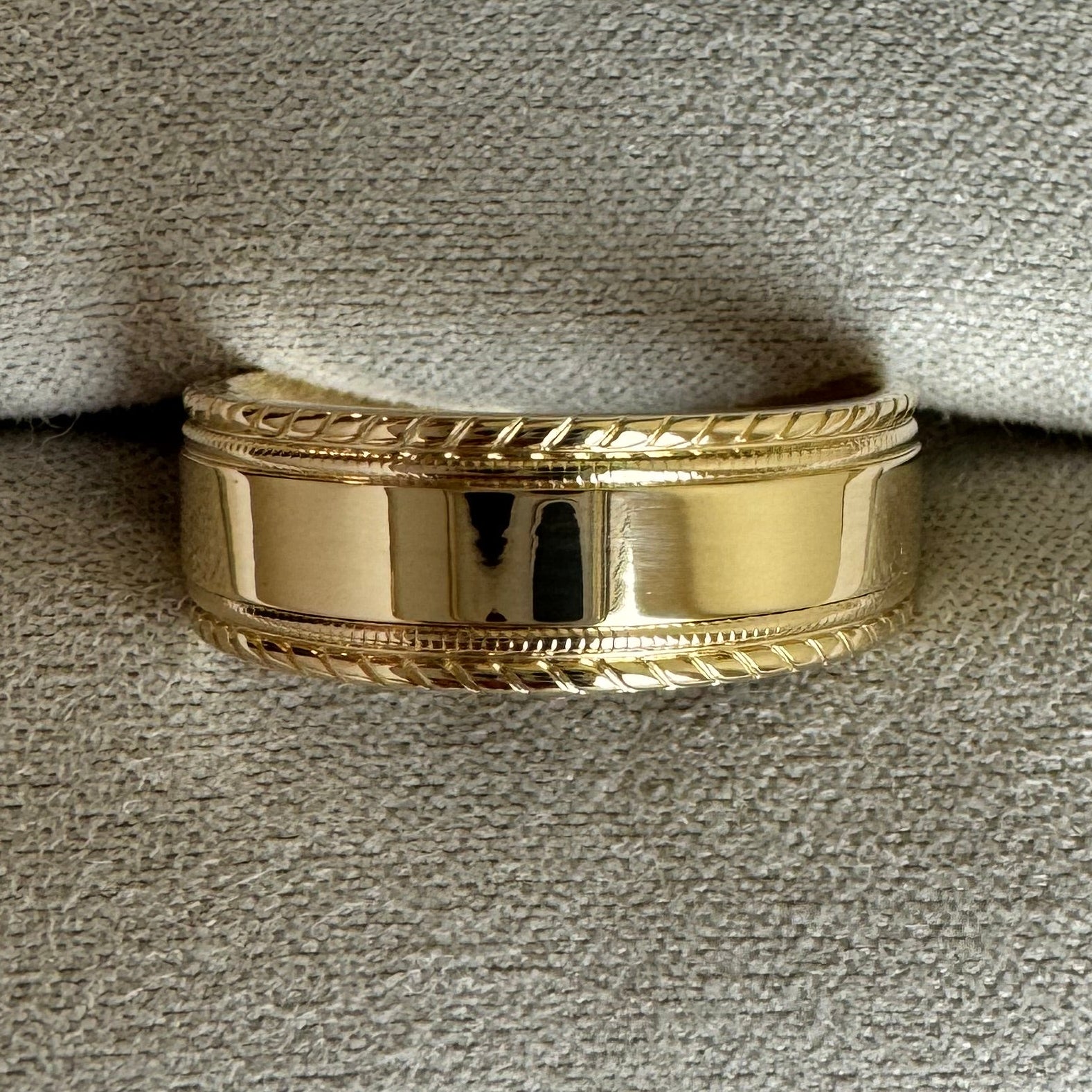10K Yellow Gold 7 mm Milgrain & Rope Stepped-Edge Comfort-Fit Flat Band. Size 7.5. The ring is engraved in Edwardian Script with "Therefore what God has joined together,"