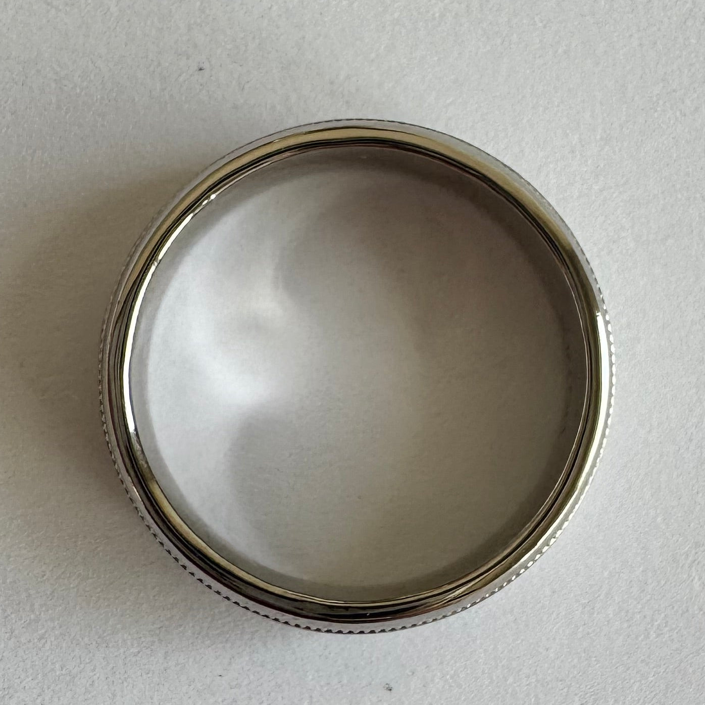 Men's 14k white gold beveled wedding band with 2 milgrained grooves, satin finish in center. Size 6.5. Metal weight=4.058 dwt.