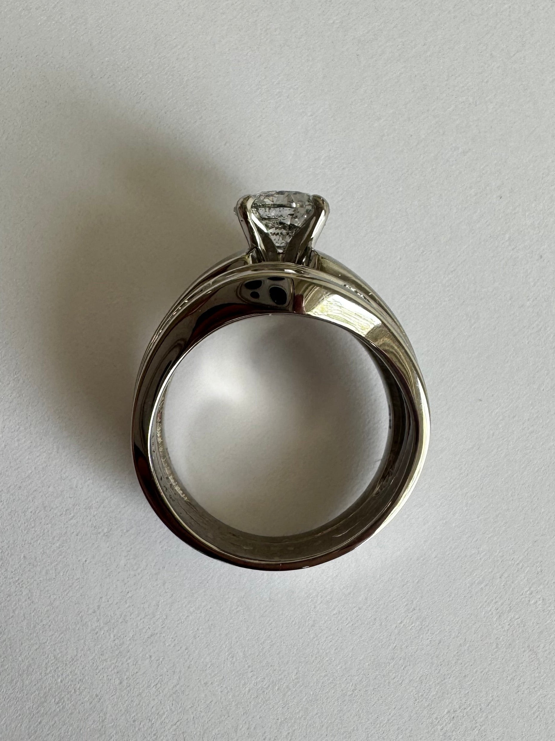 Create custom 14k white gold curved diamond wedding band to match wedding set. Weld to set. Size 6. (24 diamonds= .25 cts.)