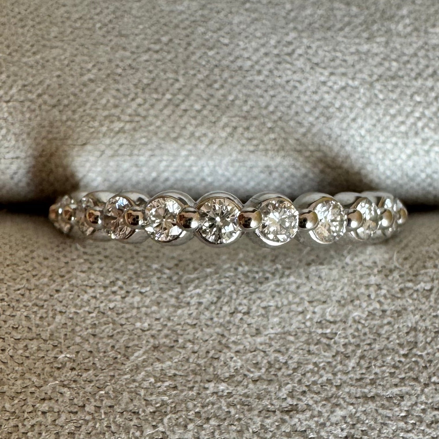 Custom 14k white gold lab grown diamond single shared prong band in a size 5.5. Approximately 0.39 cttw.