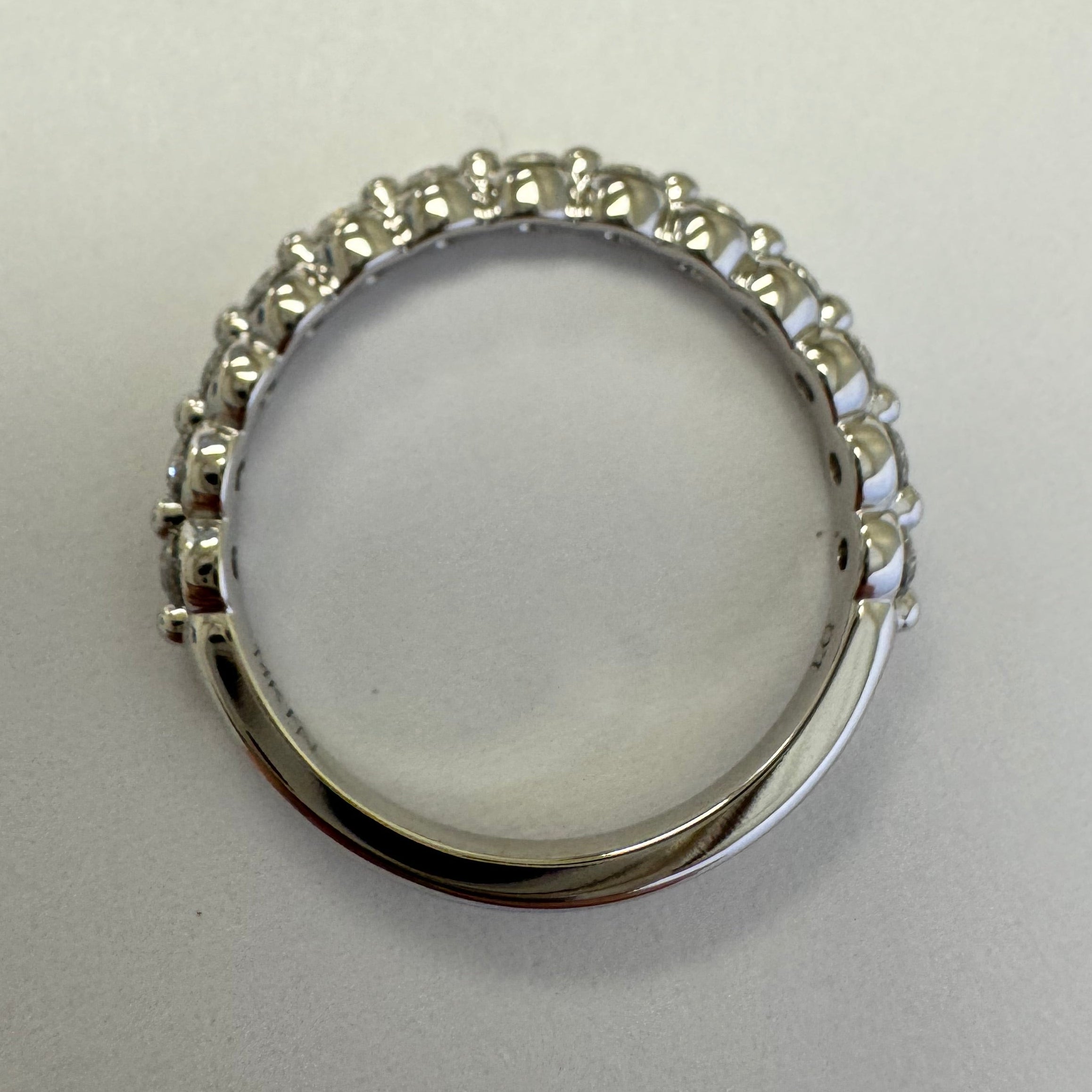 Custom 14k white gold lab grown diamond single shared prong band in a size 5.5. Approximately 0.39 cttw.