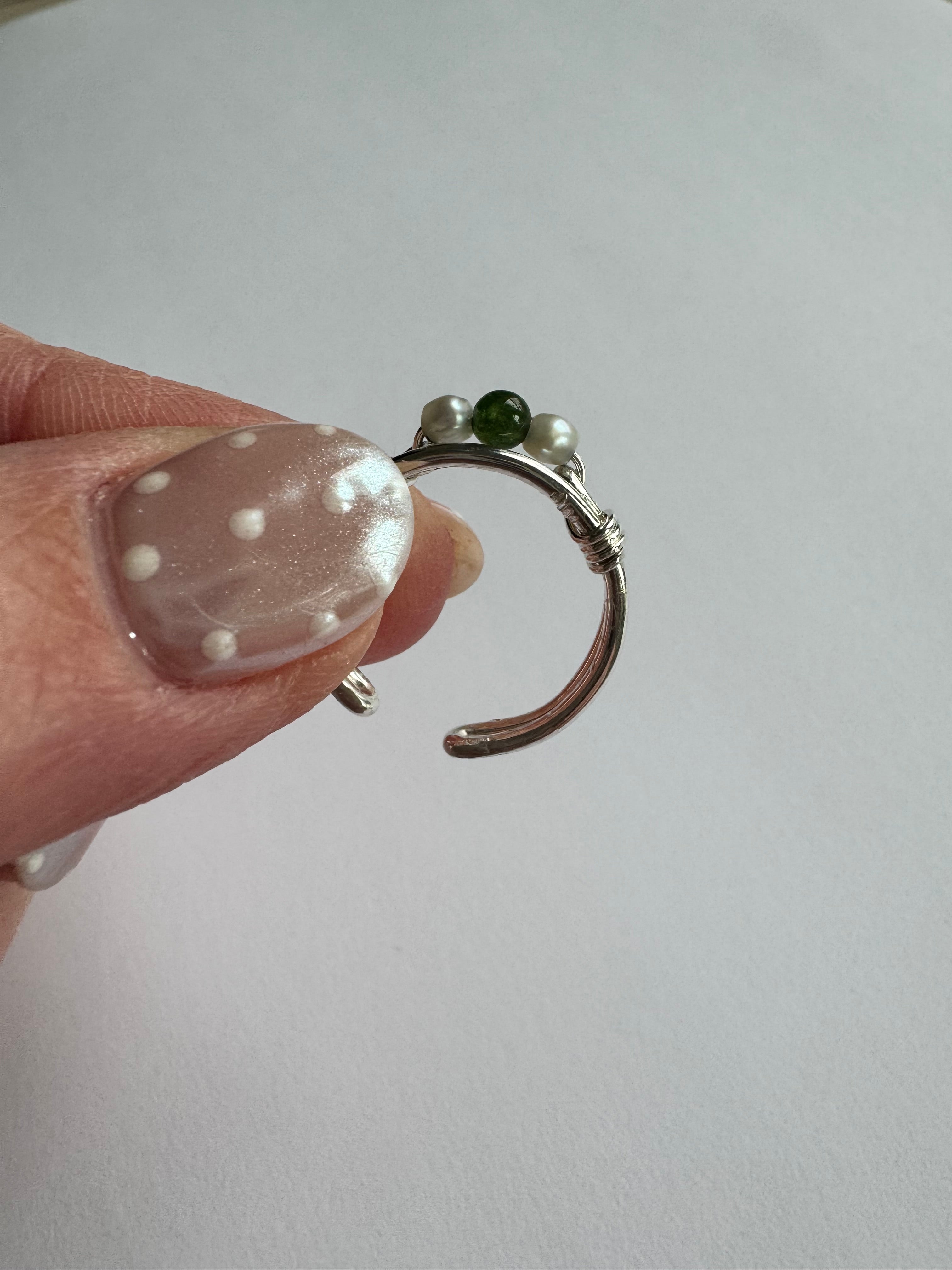 Sterling silver jade and pearl ring using customer's 2 seed pearls and supplying 1 round jade. Size 4.75 (adjustable size)