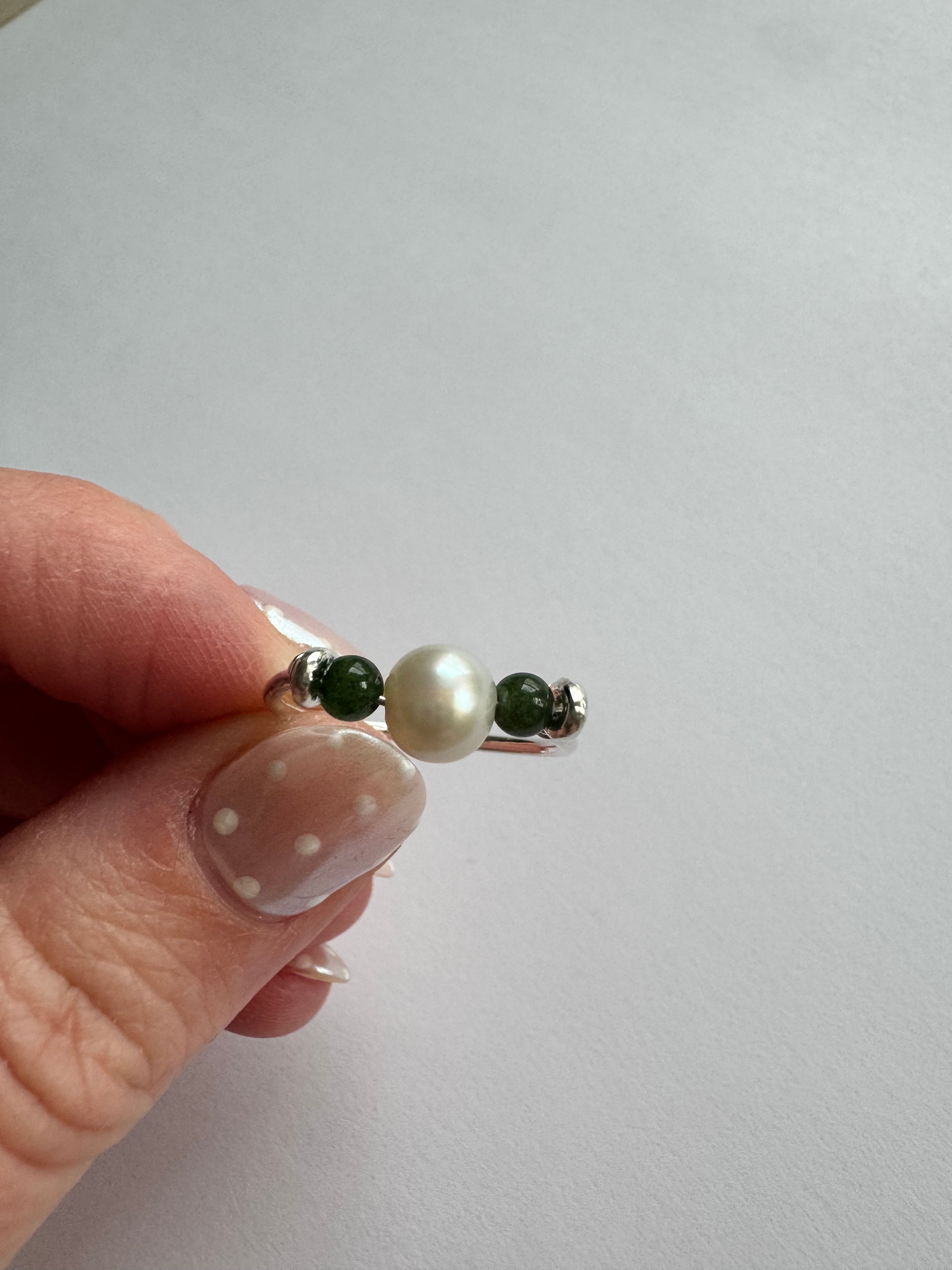 Sterling silver jade and pearl ring using customer's 1 round pearl and supplying 2 round jade. Size 6.