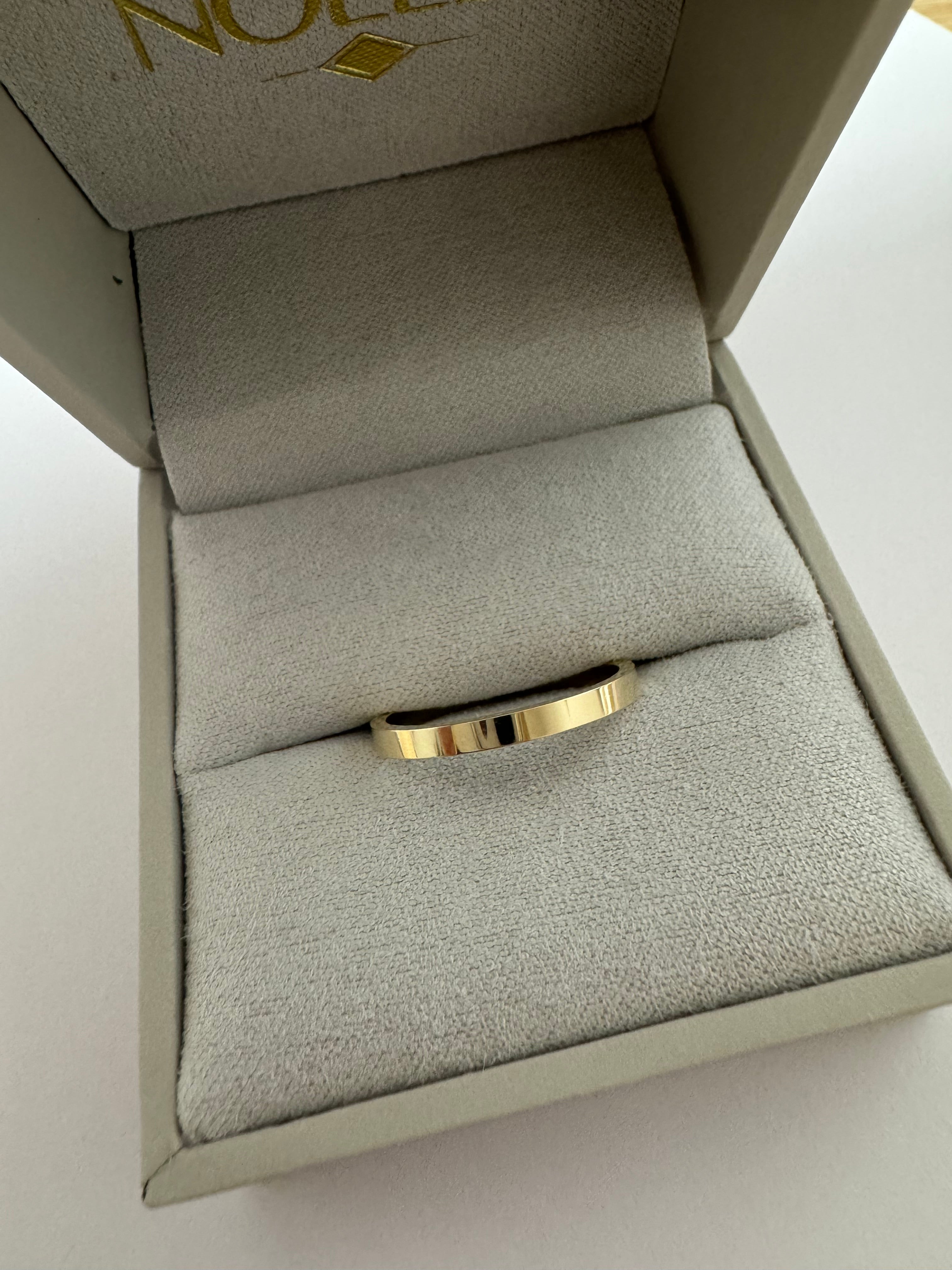 14k yellow gold flat standard fit, 2mm wide wedding band (size 7)