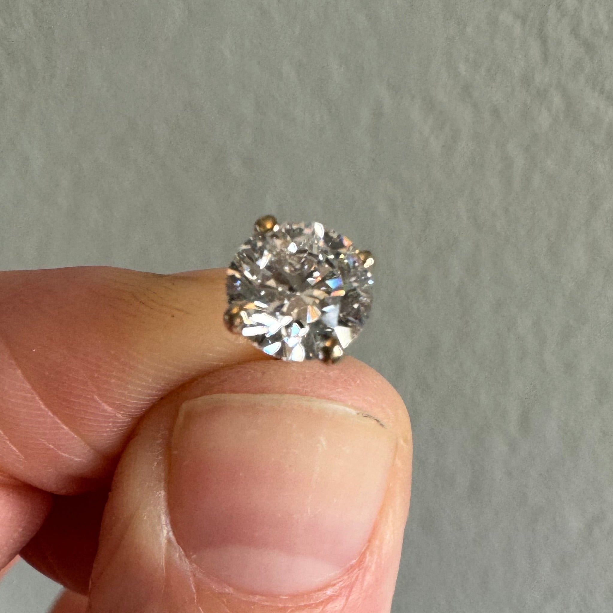 1 carat round brilliant cut lab grown diamond stud in 14k yellow gold with a press fit post & back (single stud)