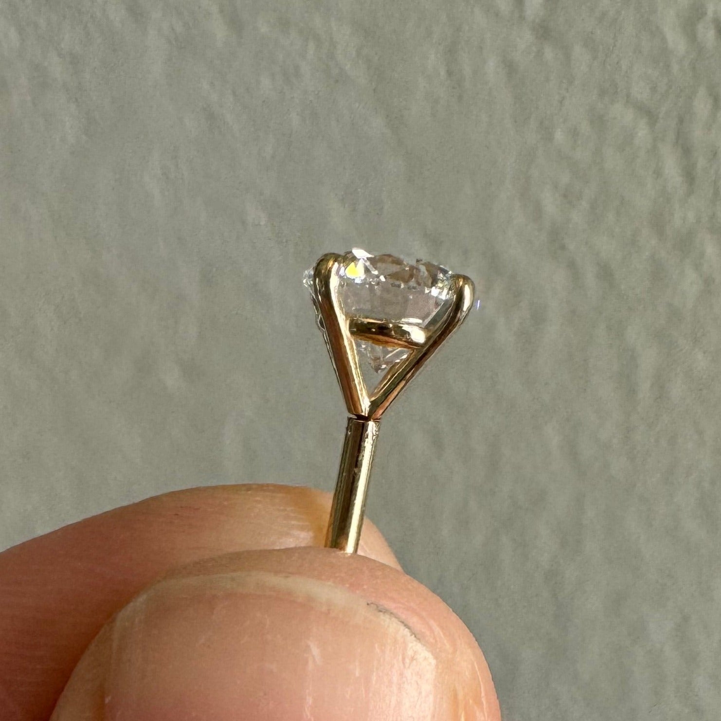 1 carat round brilliant cut lab grown diamond stud in 14k yellow gold with a press fit post & back (single stud)