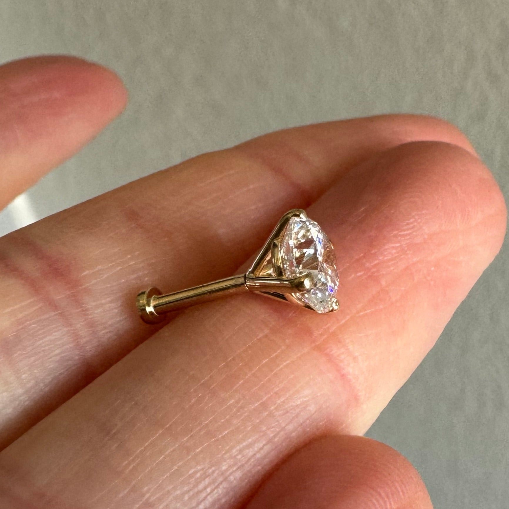 1 carat round brilliant cut lab grown diamond stud in 14k yellow gold with a press fit post & back (single stud)