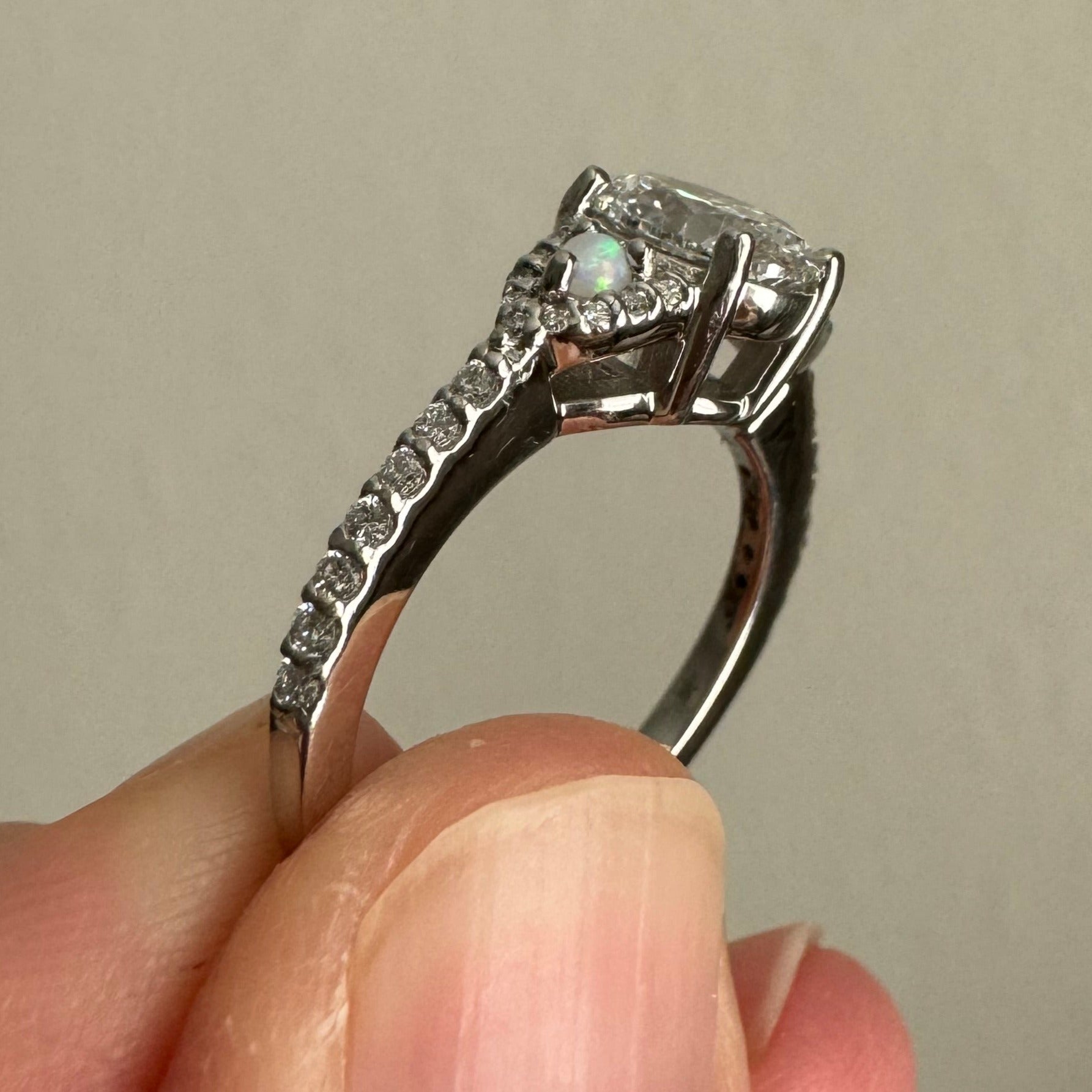 Supply & set 1.00 ct oval lab grown diamond in place of broken opal