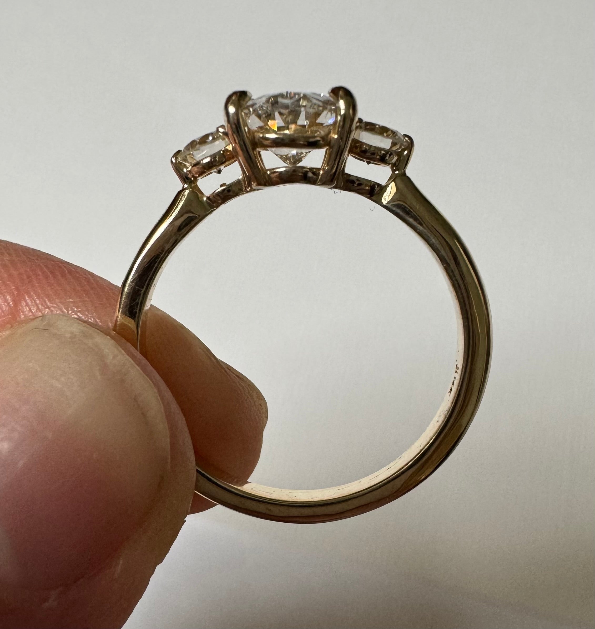 One, 14k yellow gold diamond three stone engagement ring - Size 7