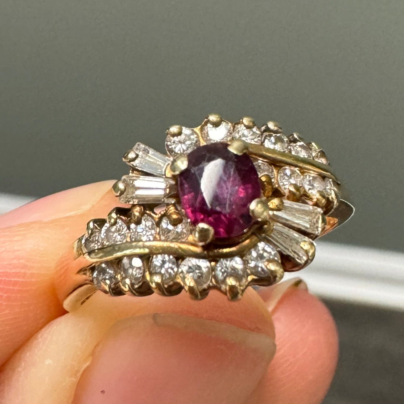 Repair: Retip center, 4 end prongs & 1 baguette. Size up to 9. (14k Yellow Gold Ruby & Diamond Fashion Ring)