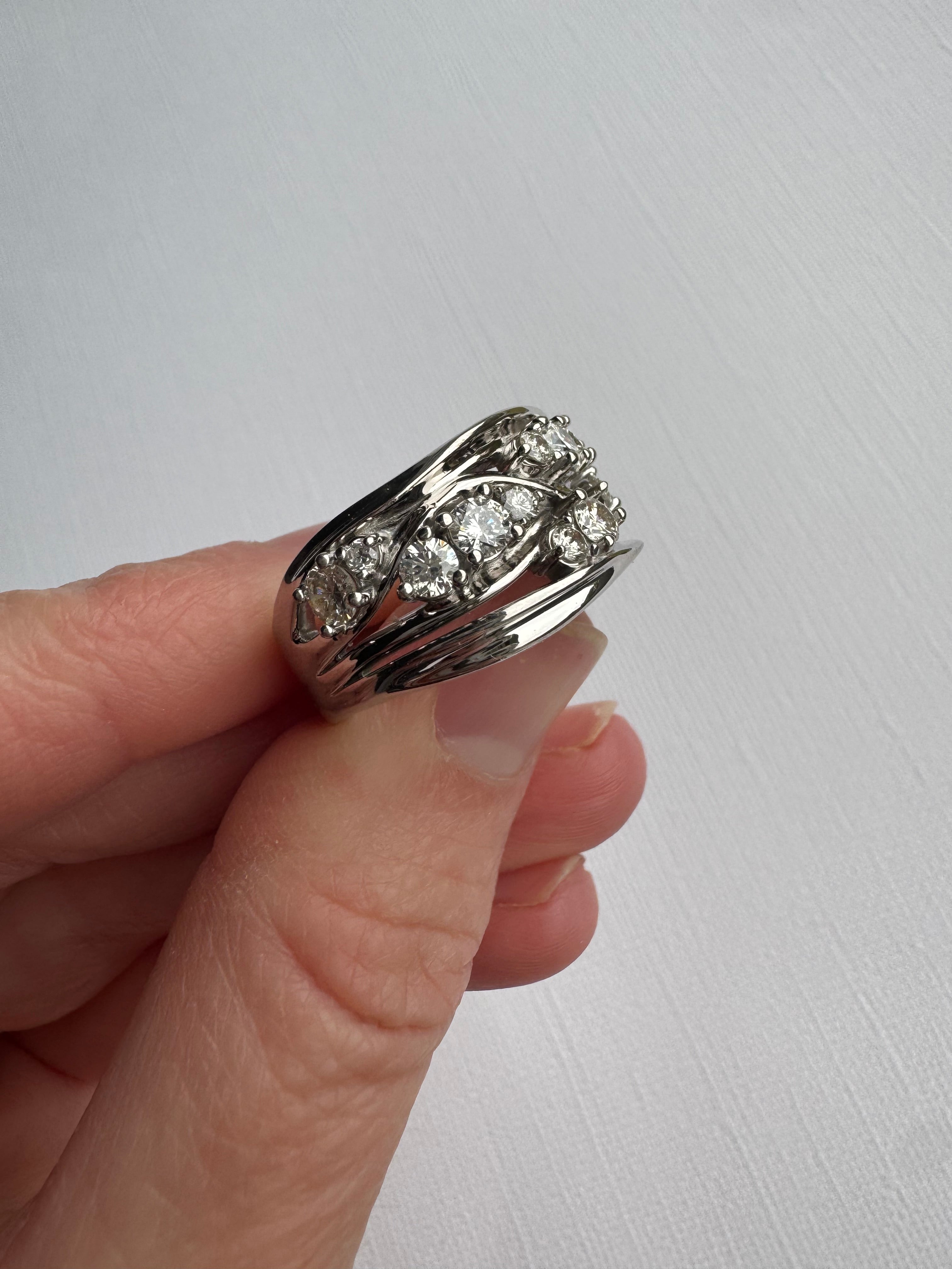 Custom 14k white gold diamond free form ring use customer's 12 round diamonds totaling 1.20 carats. Size 9.