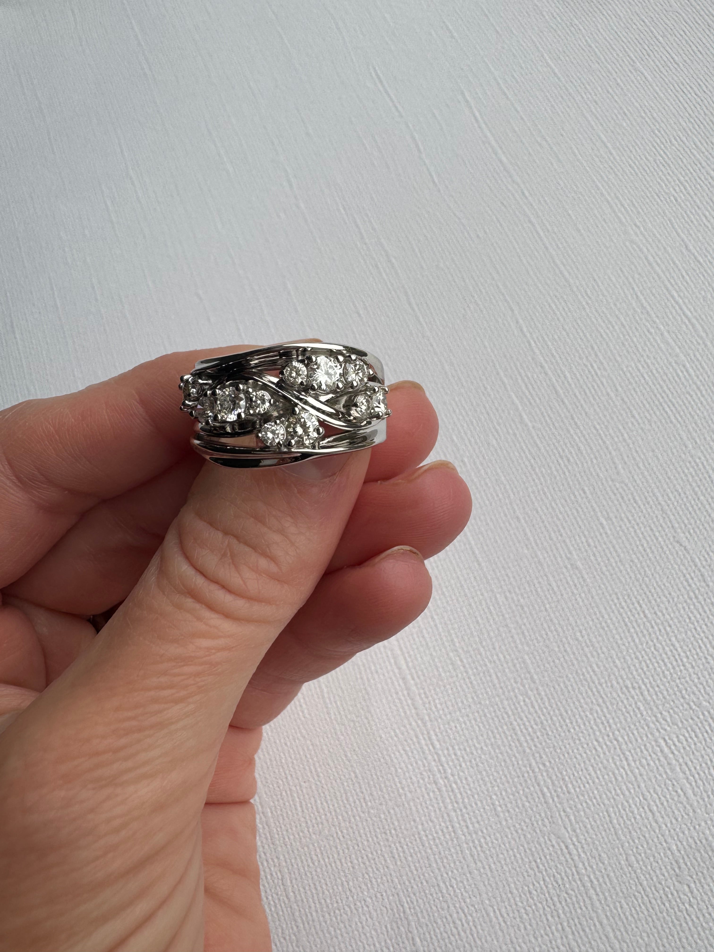 Custom 14k white gold diamond free form ring use customer's 12 round diamonds totaling 1.20 carats. Size 9.