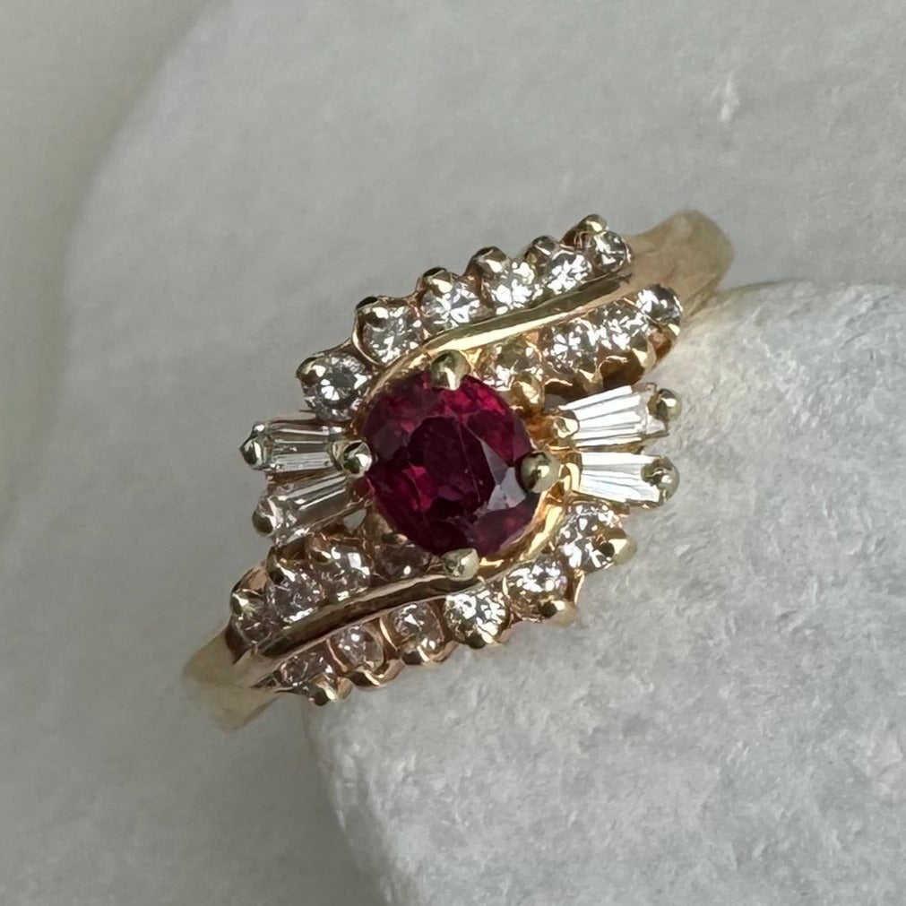 Repair: Retip center, 4 end prongs & 1 baguette. Size up to 9. (14k Yellow Gold Ruby & Diamond Fashion Ring)