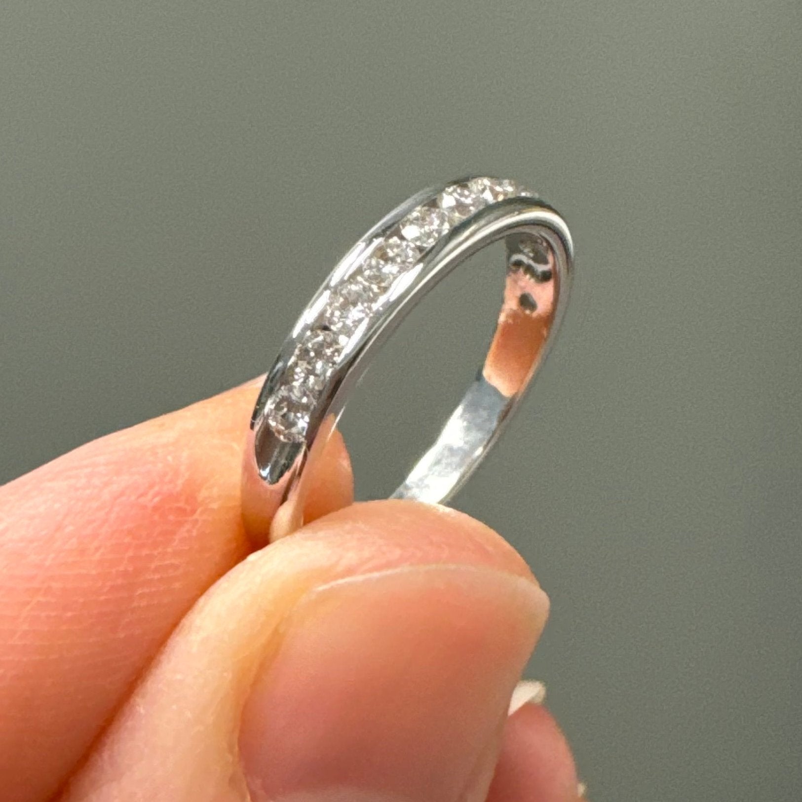Repair: Rhodium plate and supply & set 1, round, 2.1mm diamond.