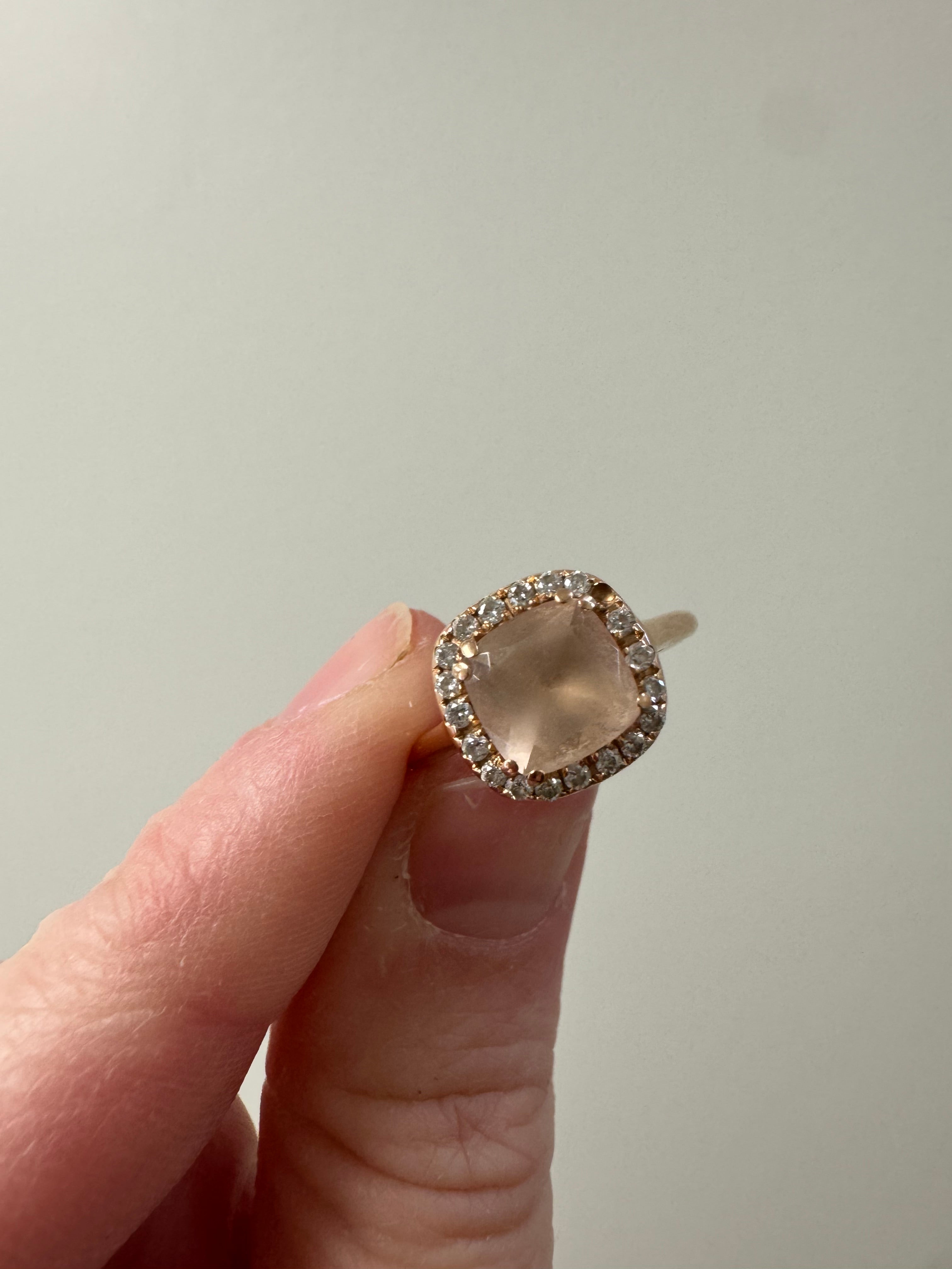 14k rose gold diamond & morganite engagement ring: Replace 7x7mm cushion morganite, retip morganite, supply 1mm round diamond and retip. Refinish.