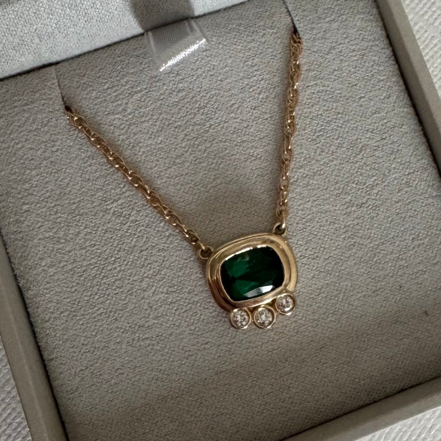 Custom 14k yellow gold bezel necklace with customer's rectangular cushion green tourmaline and 3 round diamonds on a loose rope chain (22" total)