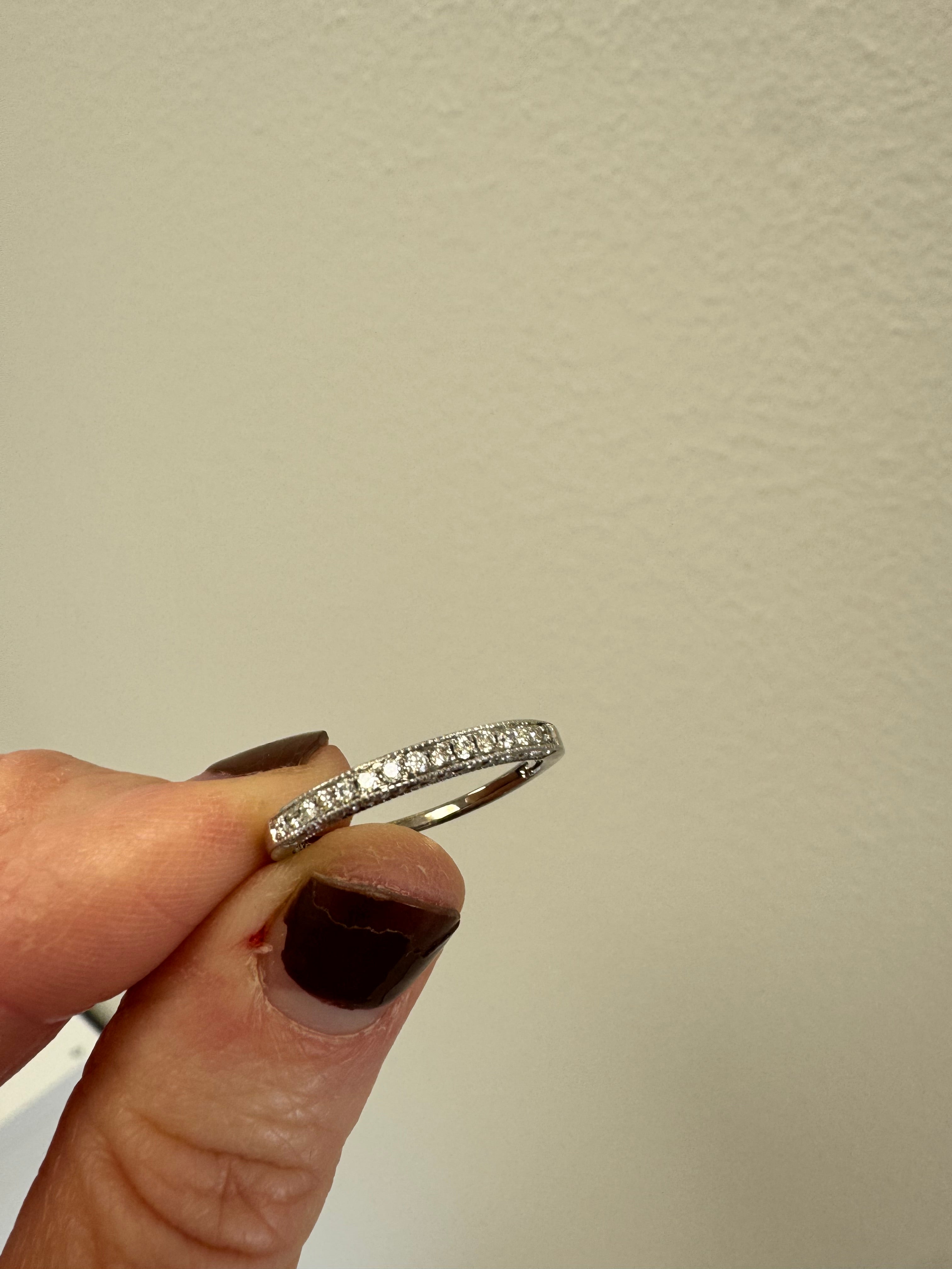 Repair: 14k white gold diamond wedding set. Remove engagement ring from soldered wedding band & refinish wedding band.