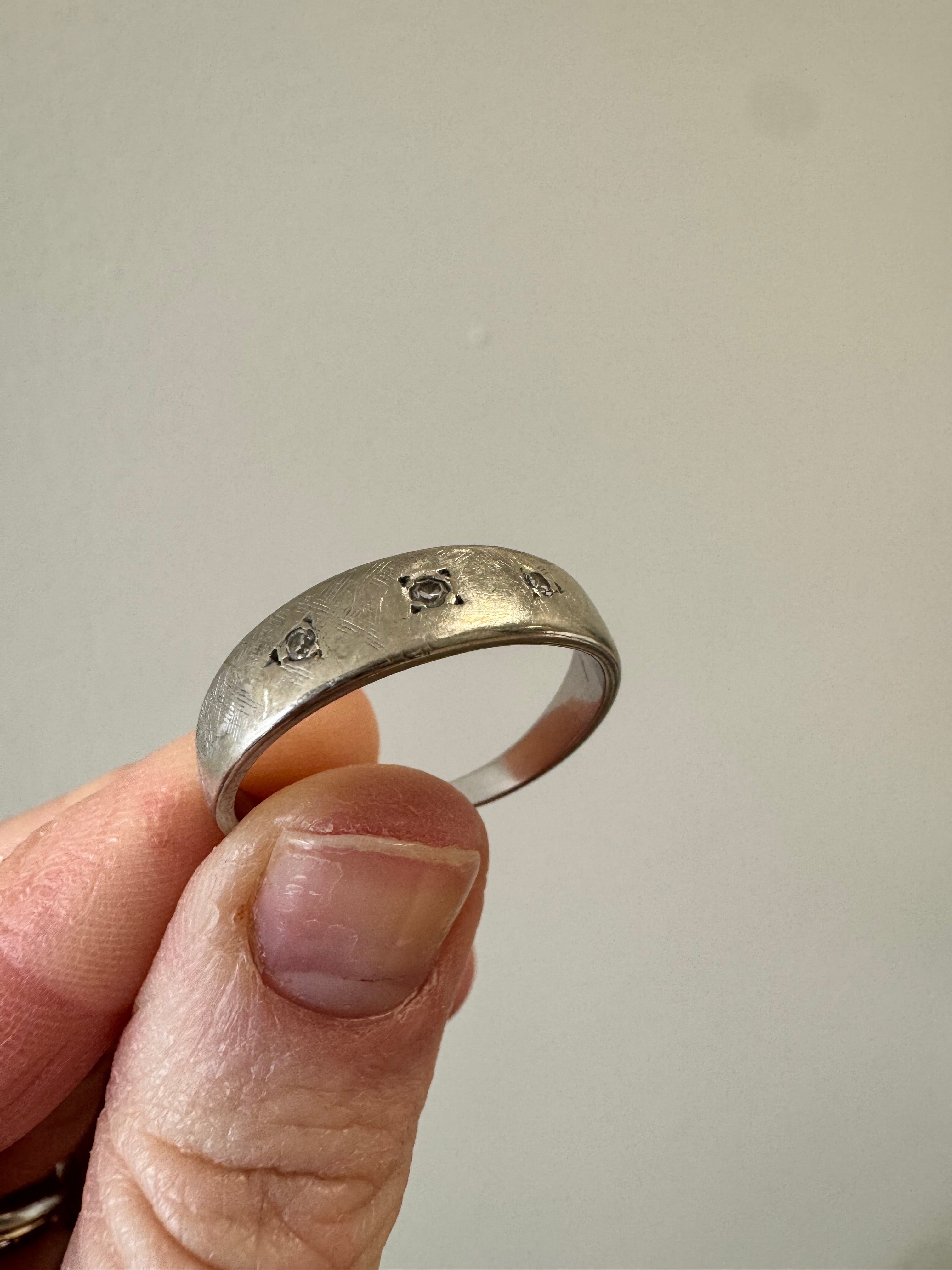 Turn white gold wedding band w/3 diamonds into pendant. Preserve engraving on back. Florentine finish on front to match original band. Supply 20", 1.6mm spiga chain in rhodiom-plated sterling silver.