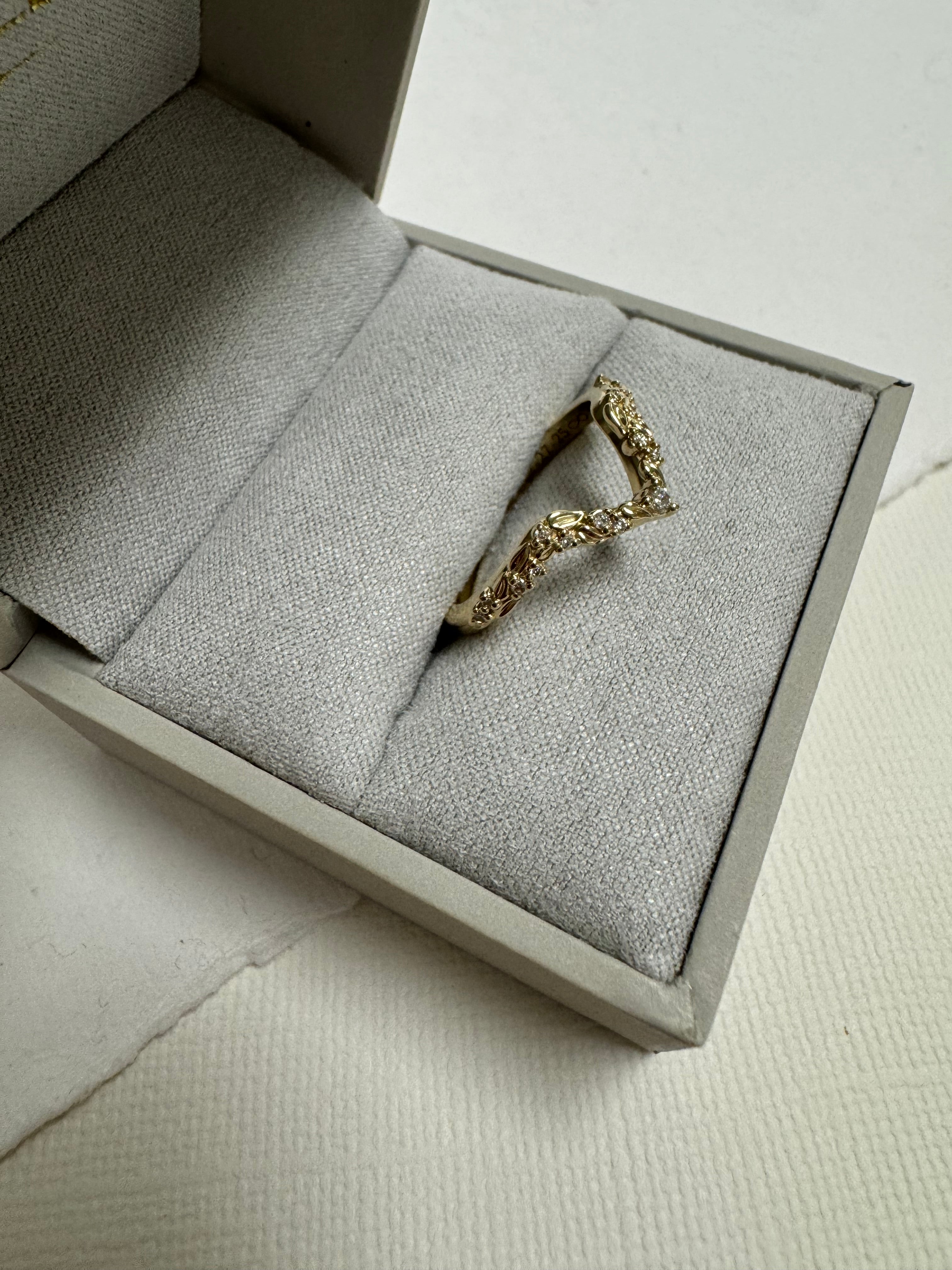 Custom 14k yellow gold lab grown diamond floral inspired curved wedding band. Size 8.5.