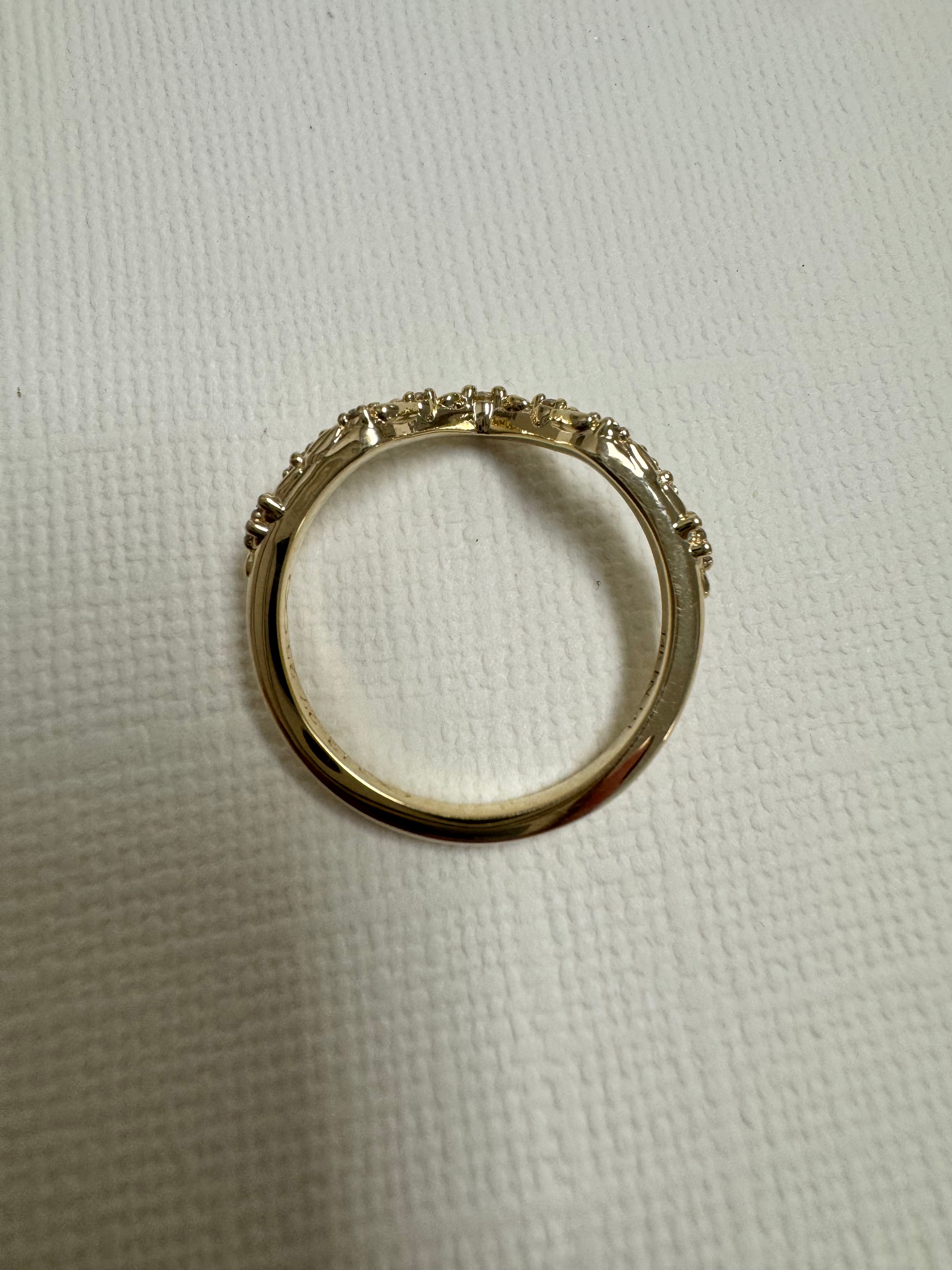 Custom 14k yellow gold lab grown diamond floral inspired curved wedding band. Size 8.5.