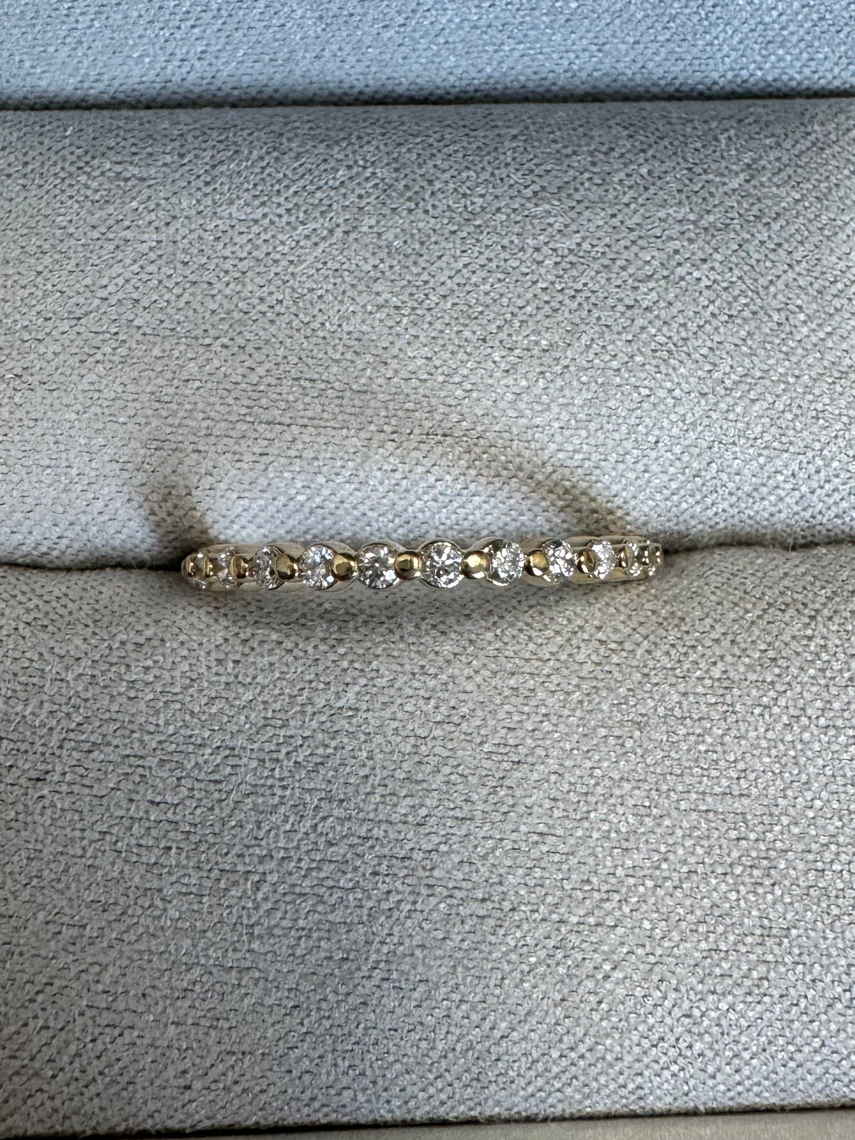 14k yellow gold round lab grown diamond wedding band. Size 5.75. 0.23 carats.