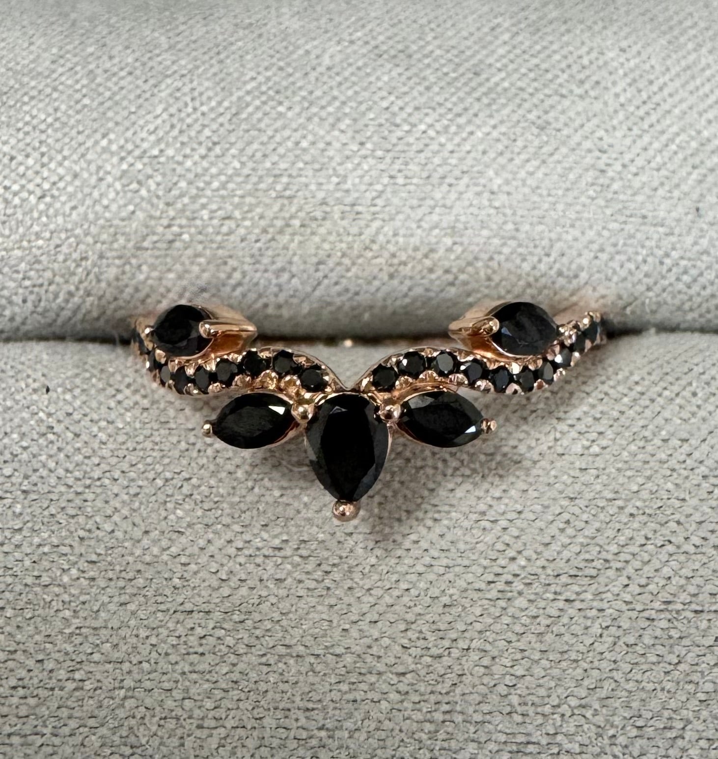 Custom 14k rose gold black diamond curved wedding band. Size 7. Total approximate carat weight= 0.53 carats.