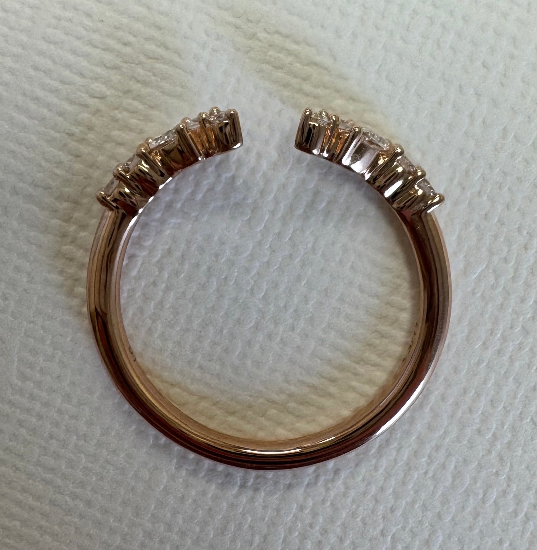 14k rose gold lab grown diamond open style wedding band. Size 8.