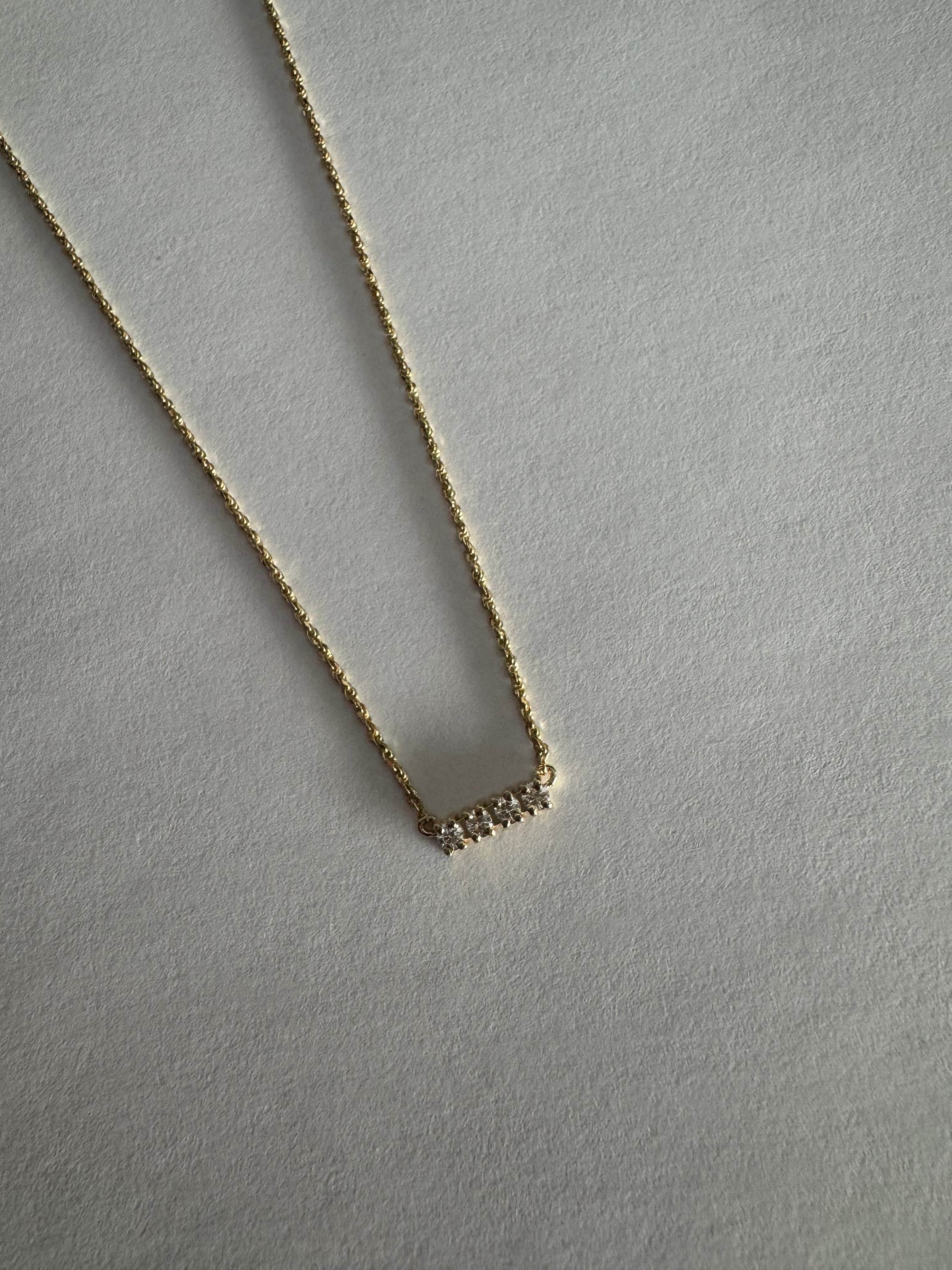 Repair break in chain on diamond bar necklace. No charge.