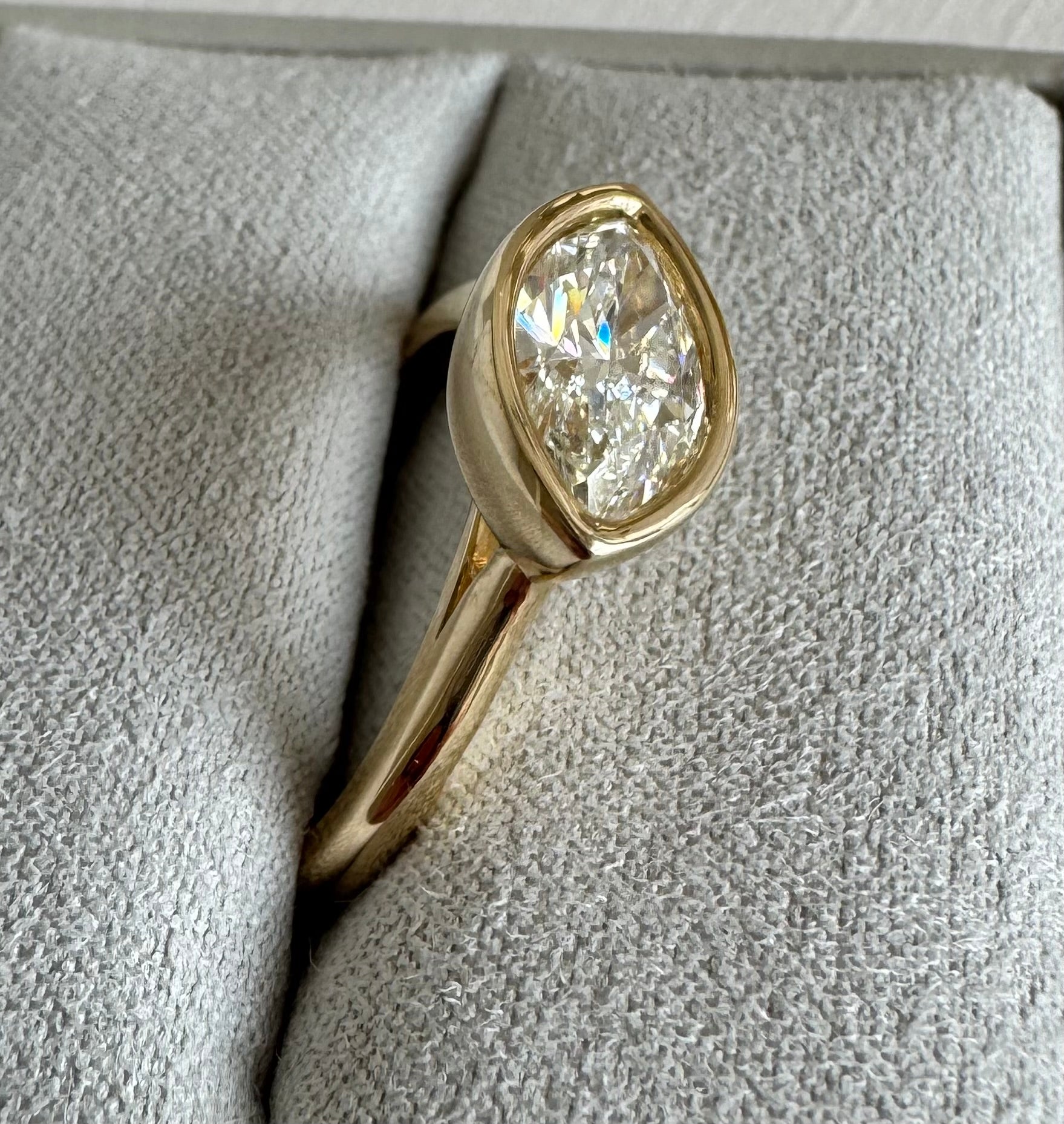Custom 10k yellow gold bezel set marquise diamond solitaire ring. Size 9. The marquise= 1.55 carats exact.