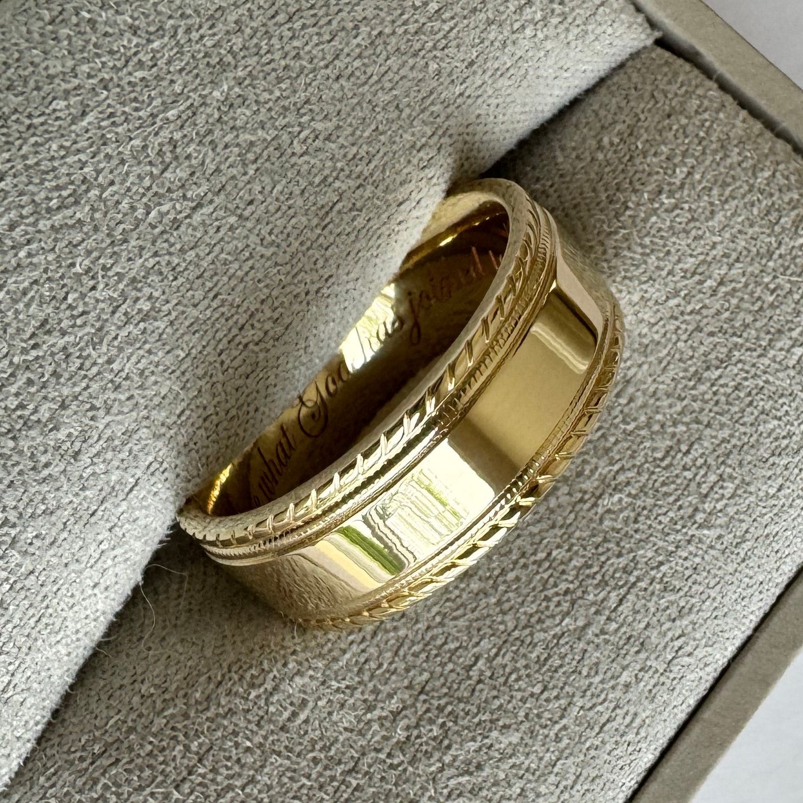10K Yellow Gold 7 mm Milgrain & Rope Stepped-Edge Comfort-Fit Flat Band. Size 7.5. The ring is engraved in Edwardian Script with "Therefore what God has joined together,"