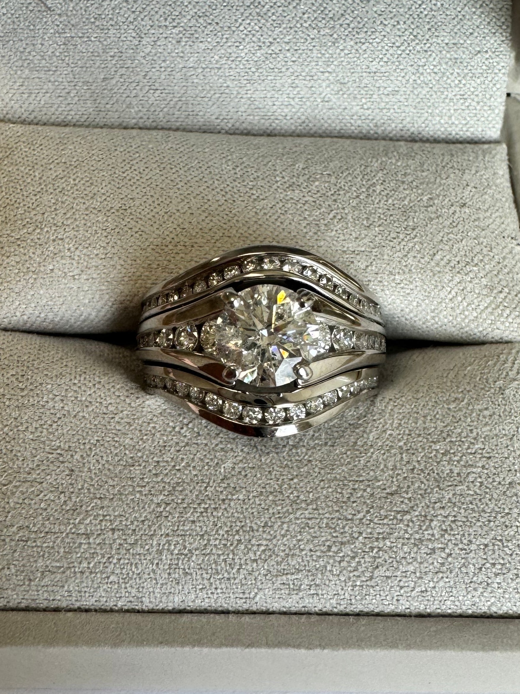 Create custom 14k white gold curved diamond wedding band to match wedding set. Weld to set. Size 6. (24 diamonds= .25 cts.)