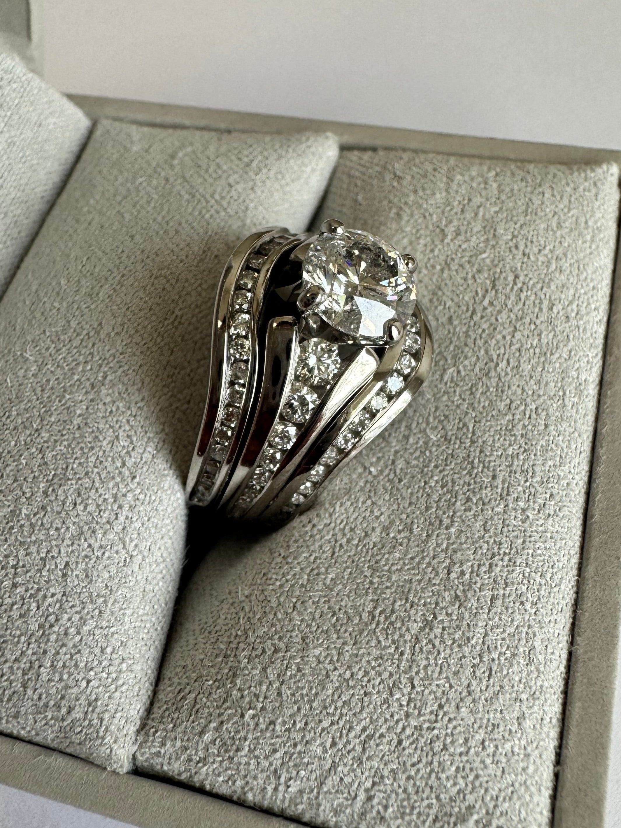 Create custom 14k white gold curved diamond wedding band to match wedding set. Weld to set. Size 6. (24 diamonds= .25 cts.)