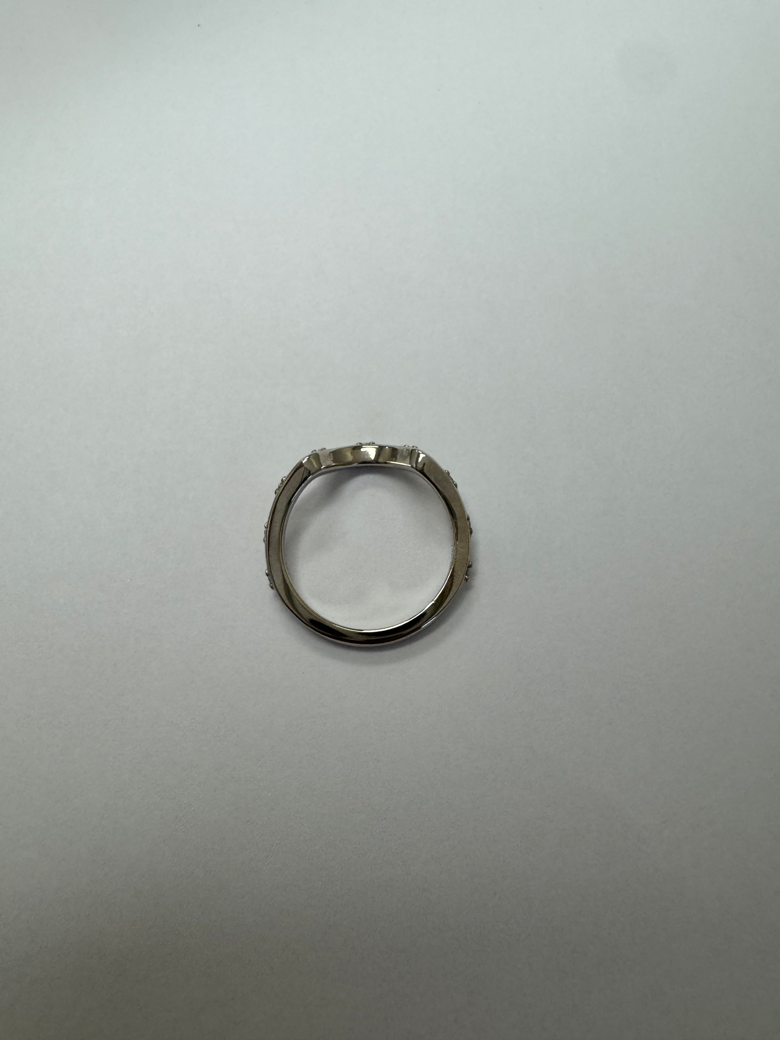 Custom 14k white gold lab grown diamond curved wedding band. Size 5.