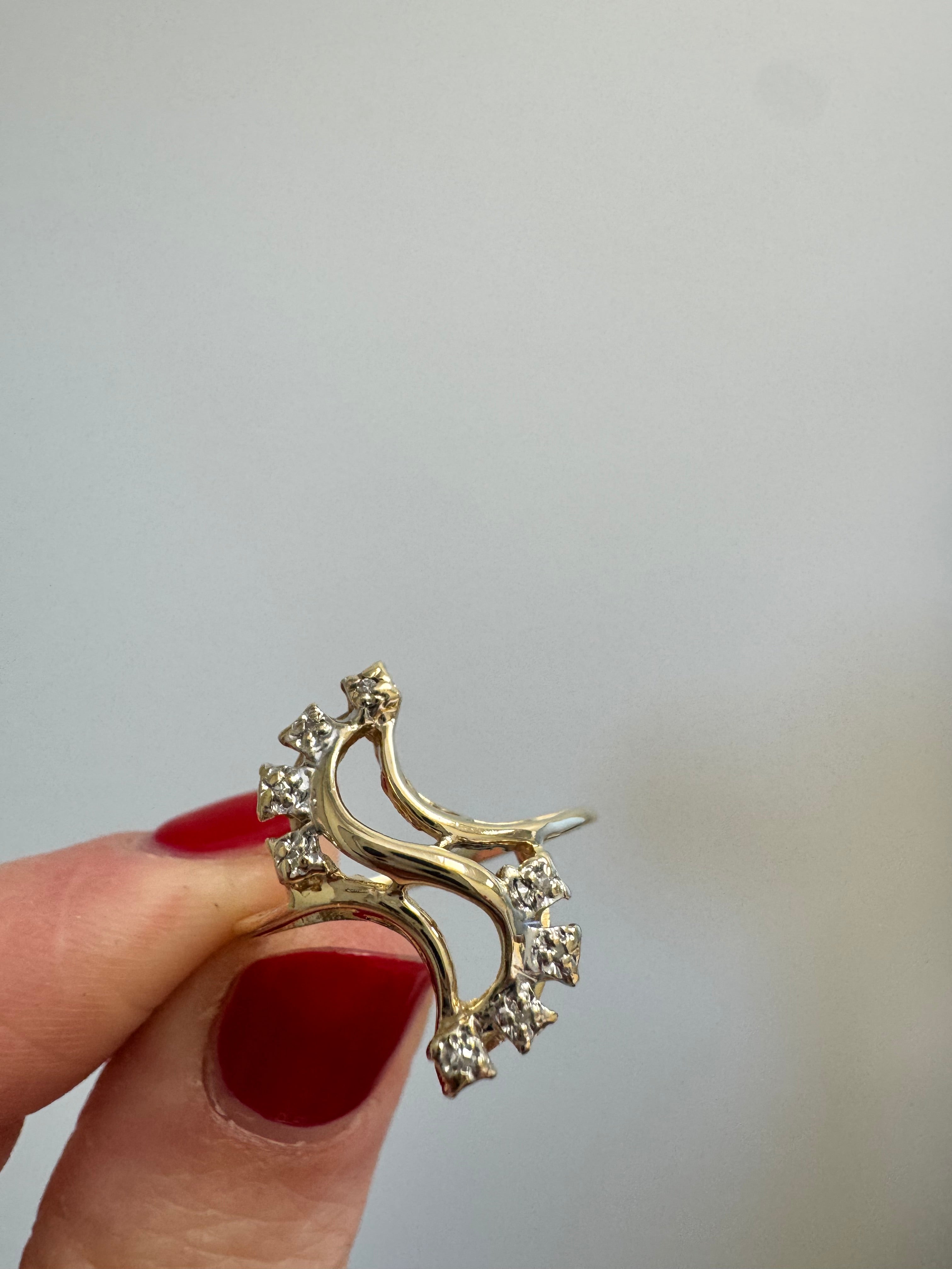 Ladies yellow gold free from, S-shaped fashion ring with 8 melee diamonds. Size up to 8.5 from 6.