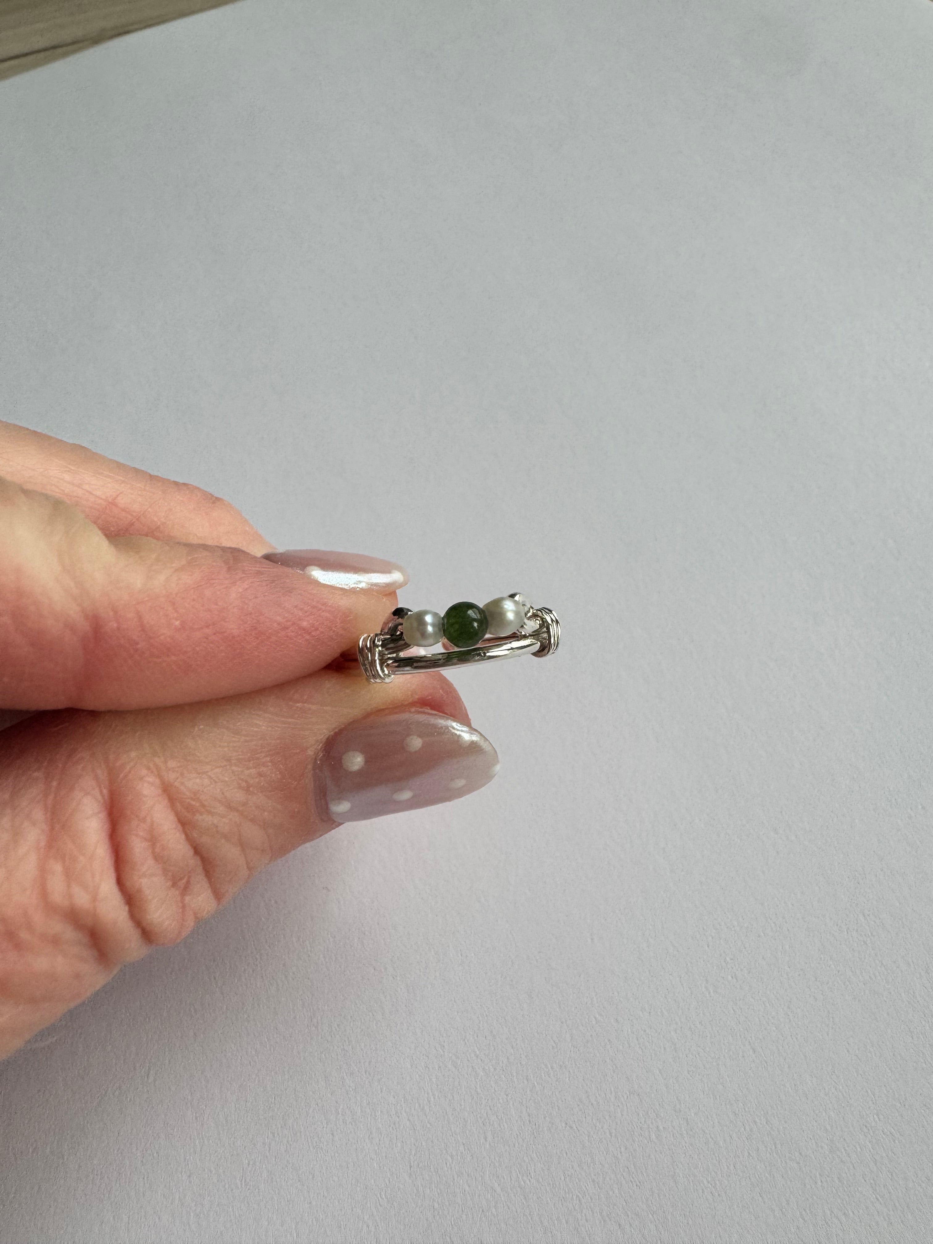 Sterling silver jade and pearl ring using customer's 2 seed pearls and supplying 1 round jade. Size 4.75 (adjustable size)