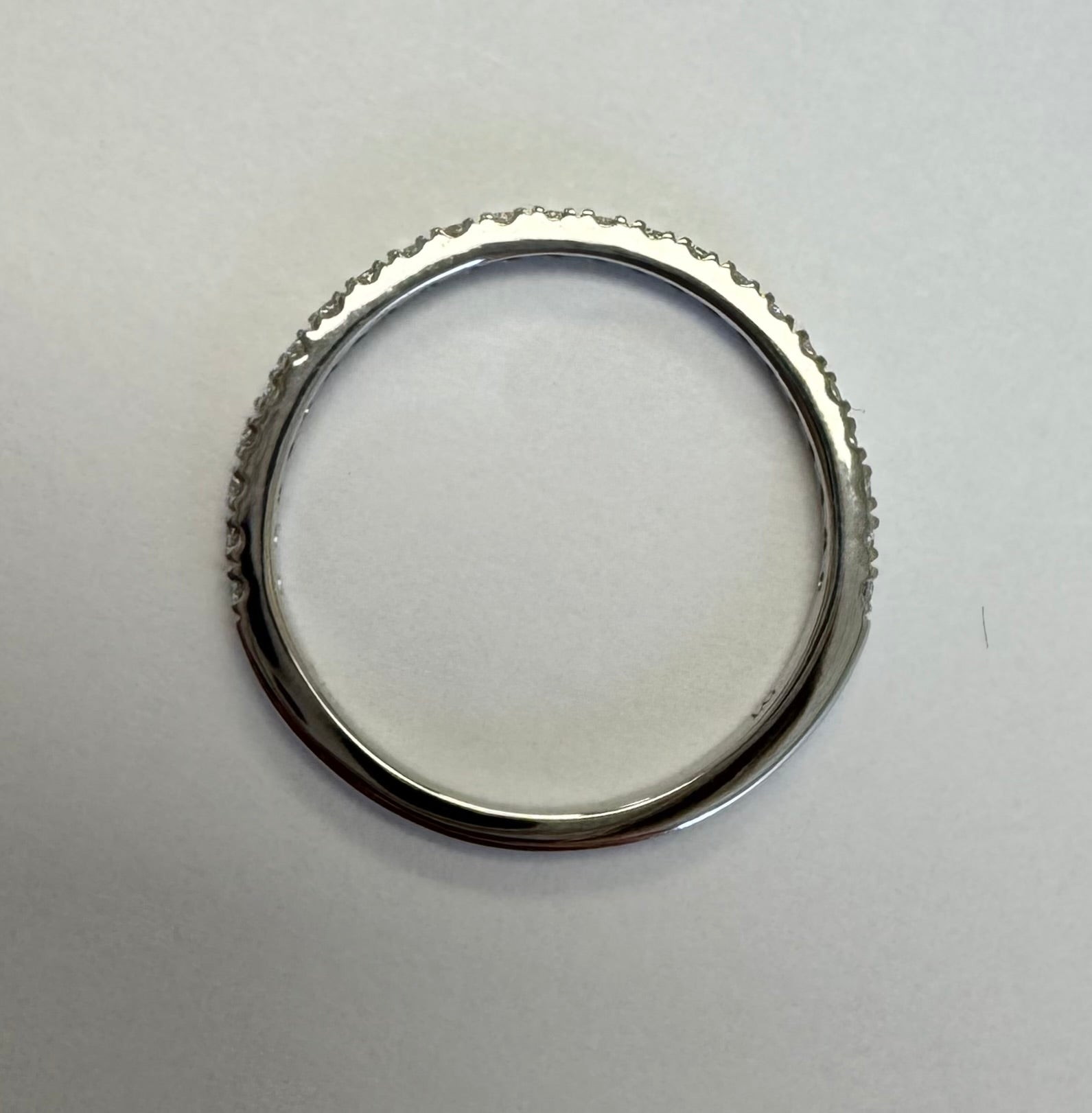 14k white gold lab grown diamond wedding band. Size 5.75. Total carat weight= approx. 0.23 cts.