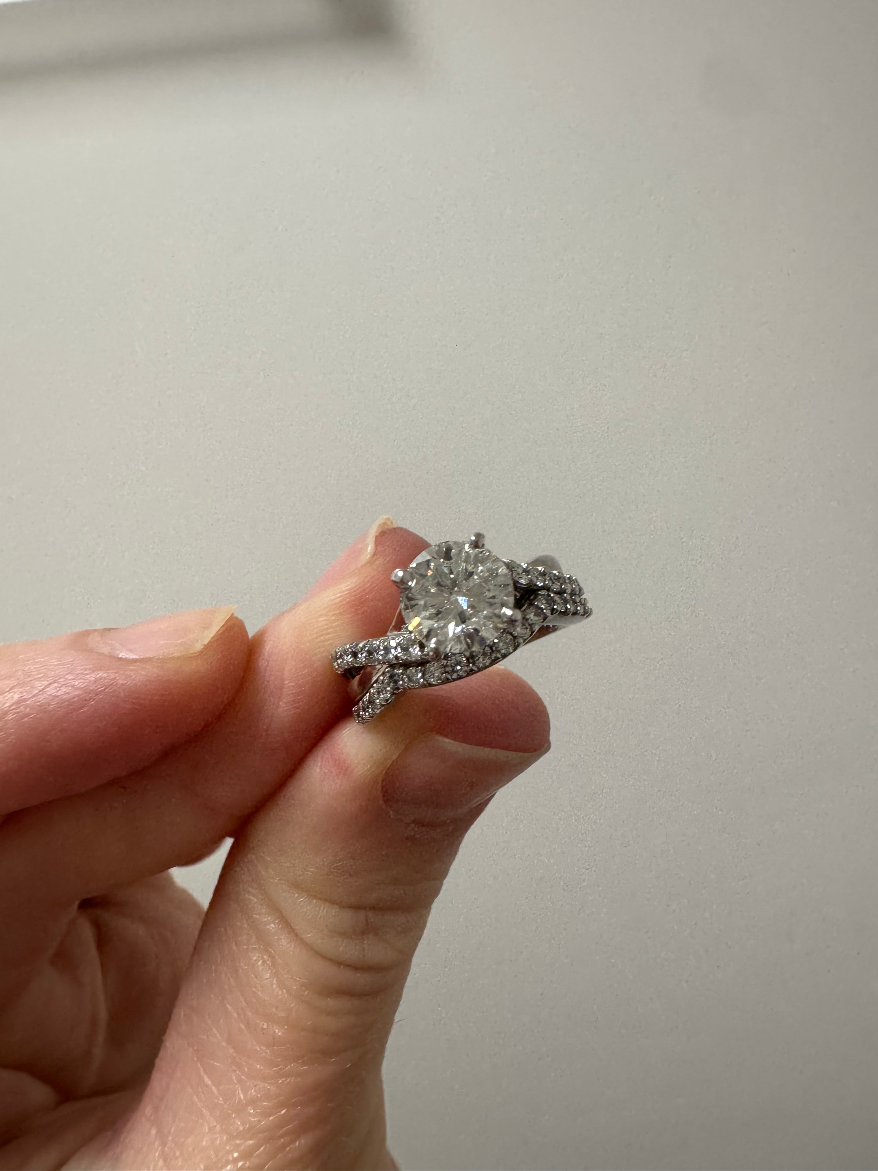 Rhodium and refinish white gold diamond criss cross style wedding set (soldered)
