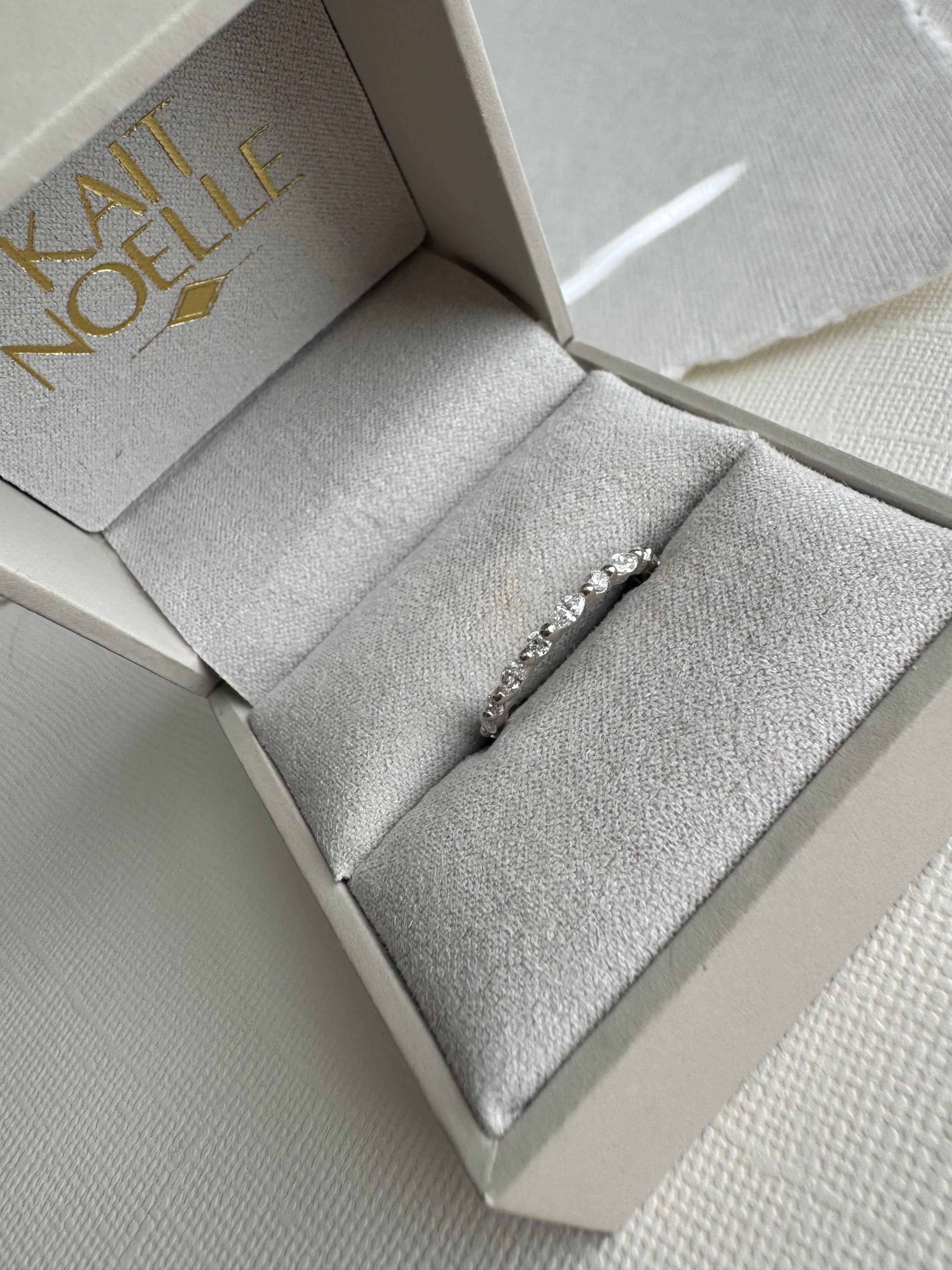 14k white gold lab grown round and marquise diamond wedding band. Size 5.75. Carat weight= approx. 0.37 cts. approx: