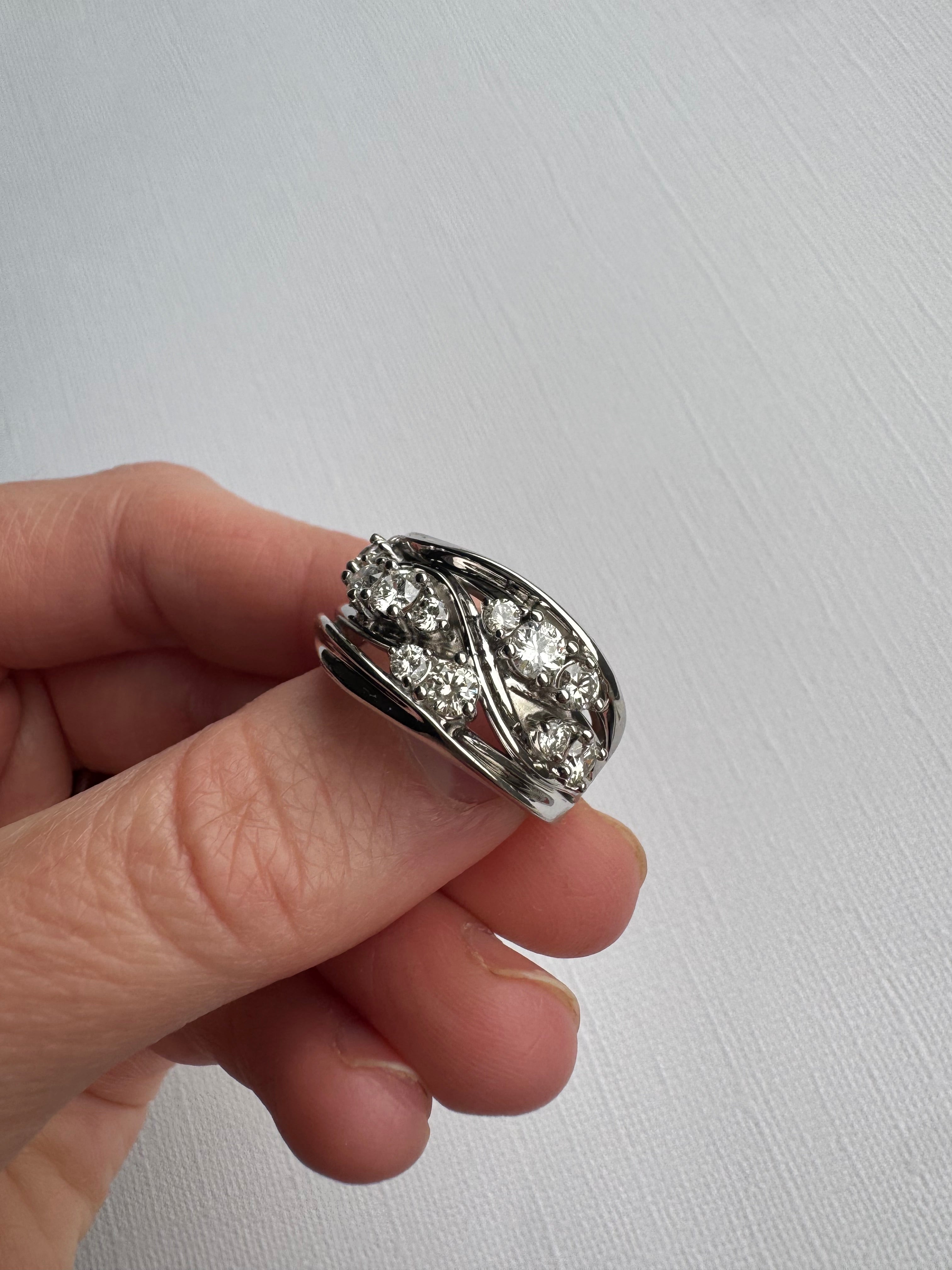 Custom 14k white gold diamond free form ring use customer's 12 round diamonds totaling 1.20 carats. Size 9.