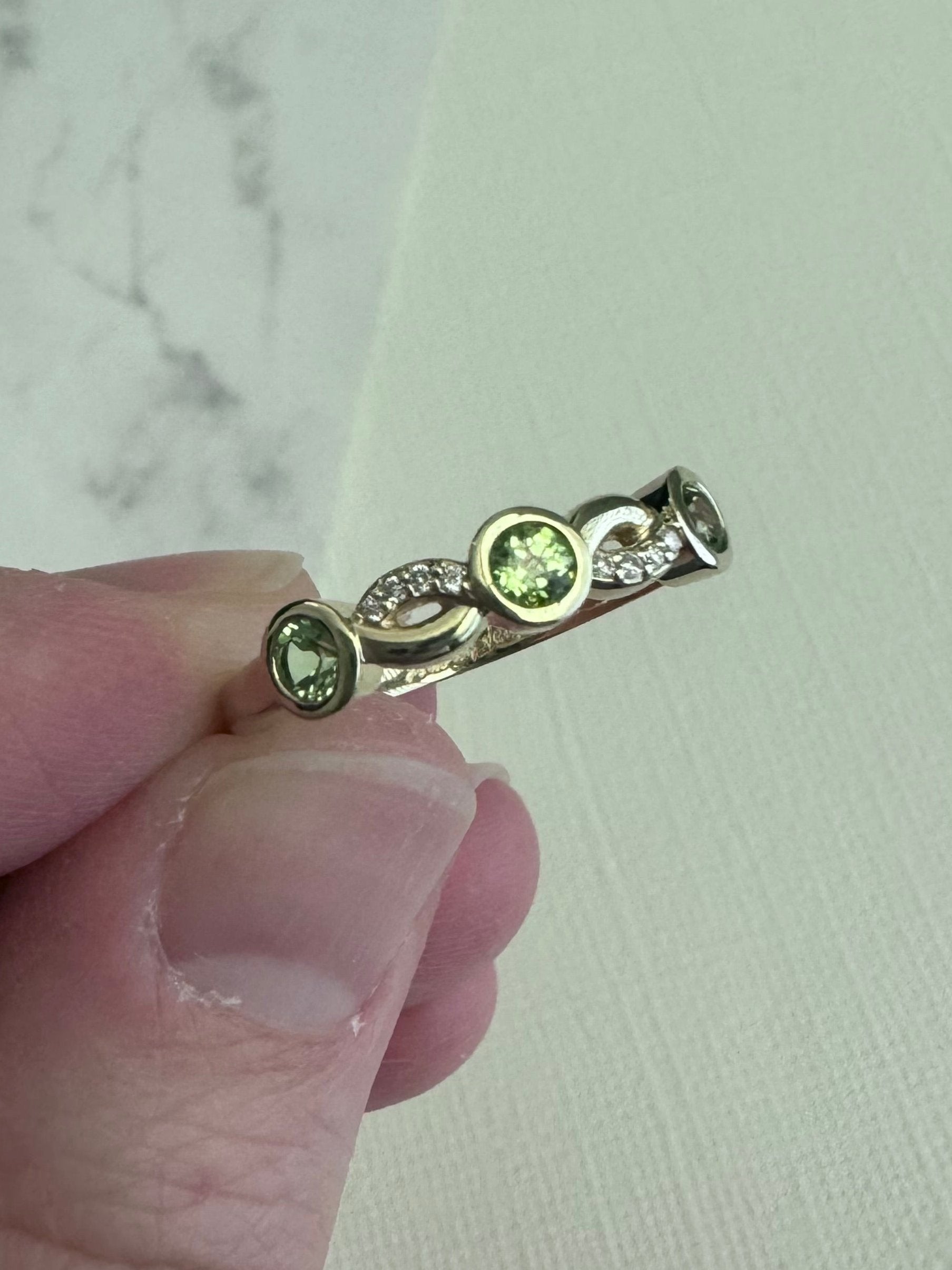 10k yellow gold peridot and lab grown diamond bezel twist ring with engraving- Size 7.